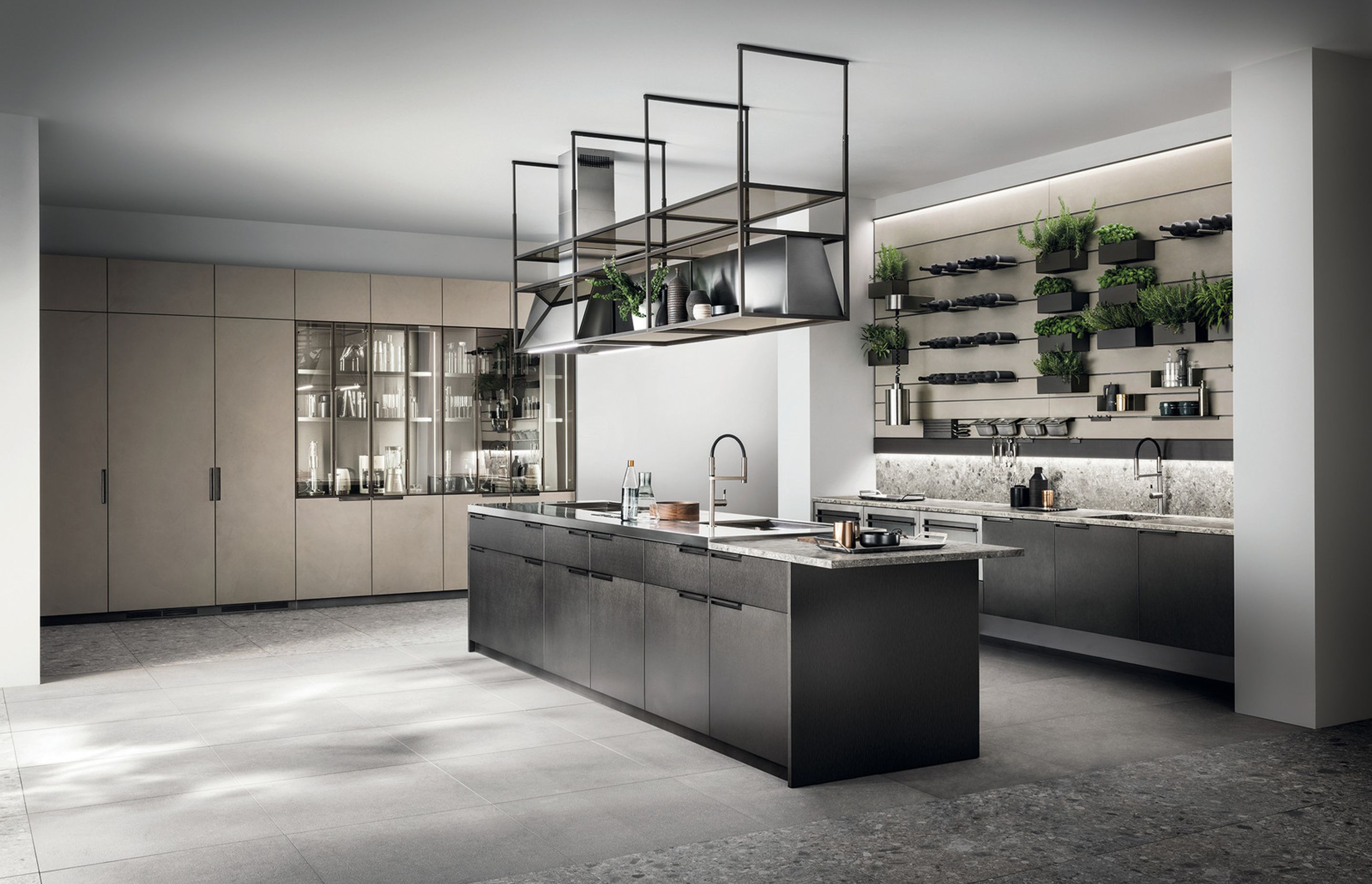 A hanging storage structure (with visible dish-rack) and professional extraction create new volumes. Compositional rigour, to respect your food preparation systems, washing, chopping and cooking, just like in a large, professional kitchen.