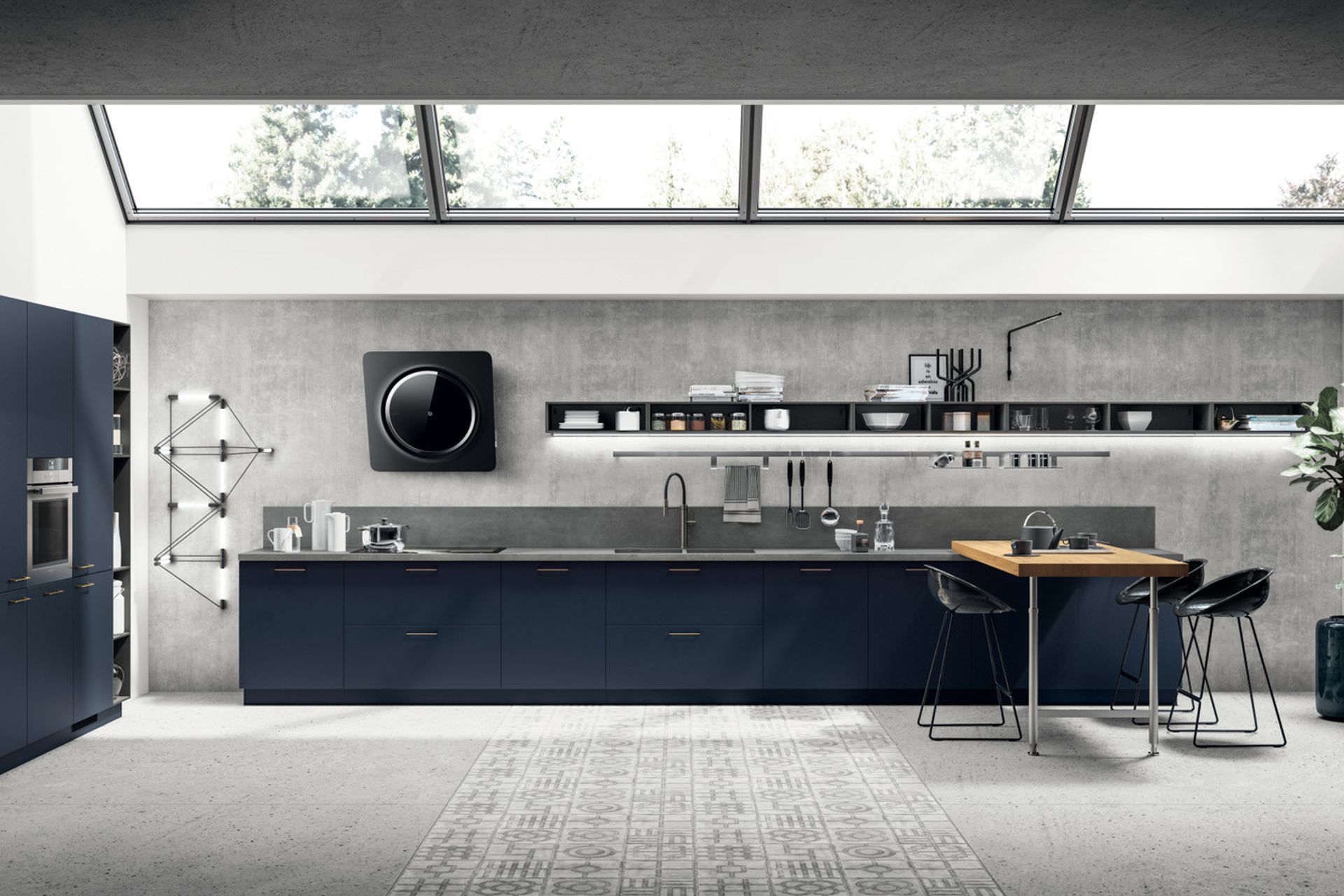  A modern kitchen with a notable navy feel: the new Moon Blue lacquered finish on the base units and tall units is matched perfectly by the breakfast bench in Nordik Oak fitted with Slender support.