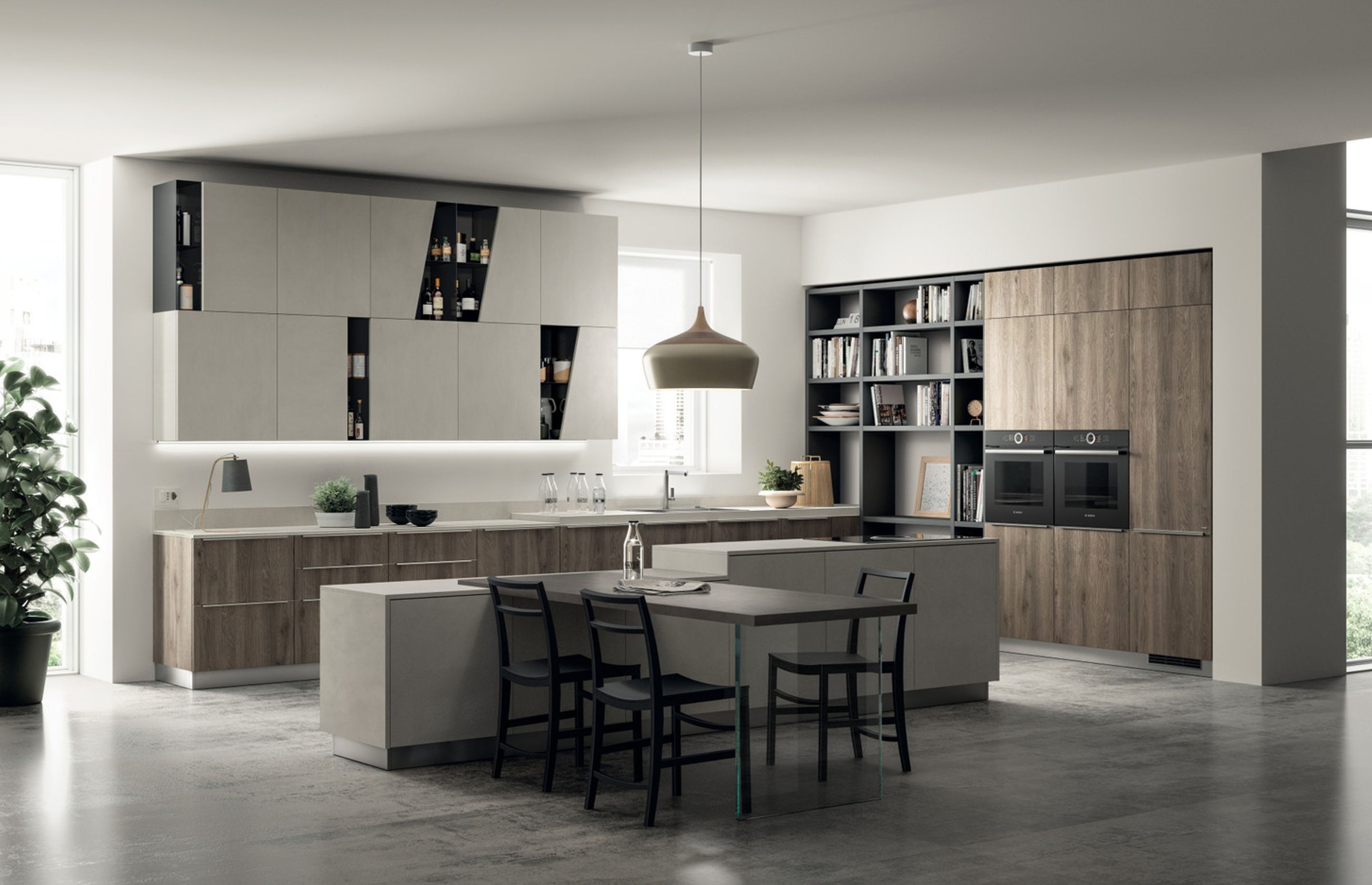 The different heights of the Azimut laminate worktops, which is also used on the island, make this kitchen more dynamic and emphasise the various functions of the composition. And the juxtaposed colour shades (tall units and base units in Season Oak, against the island in Azimut decorative melamine) make it possible to create ever surprising combinations.