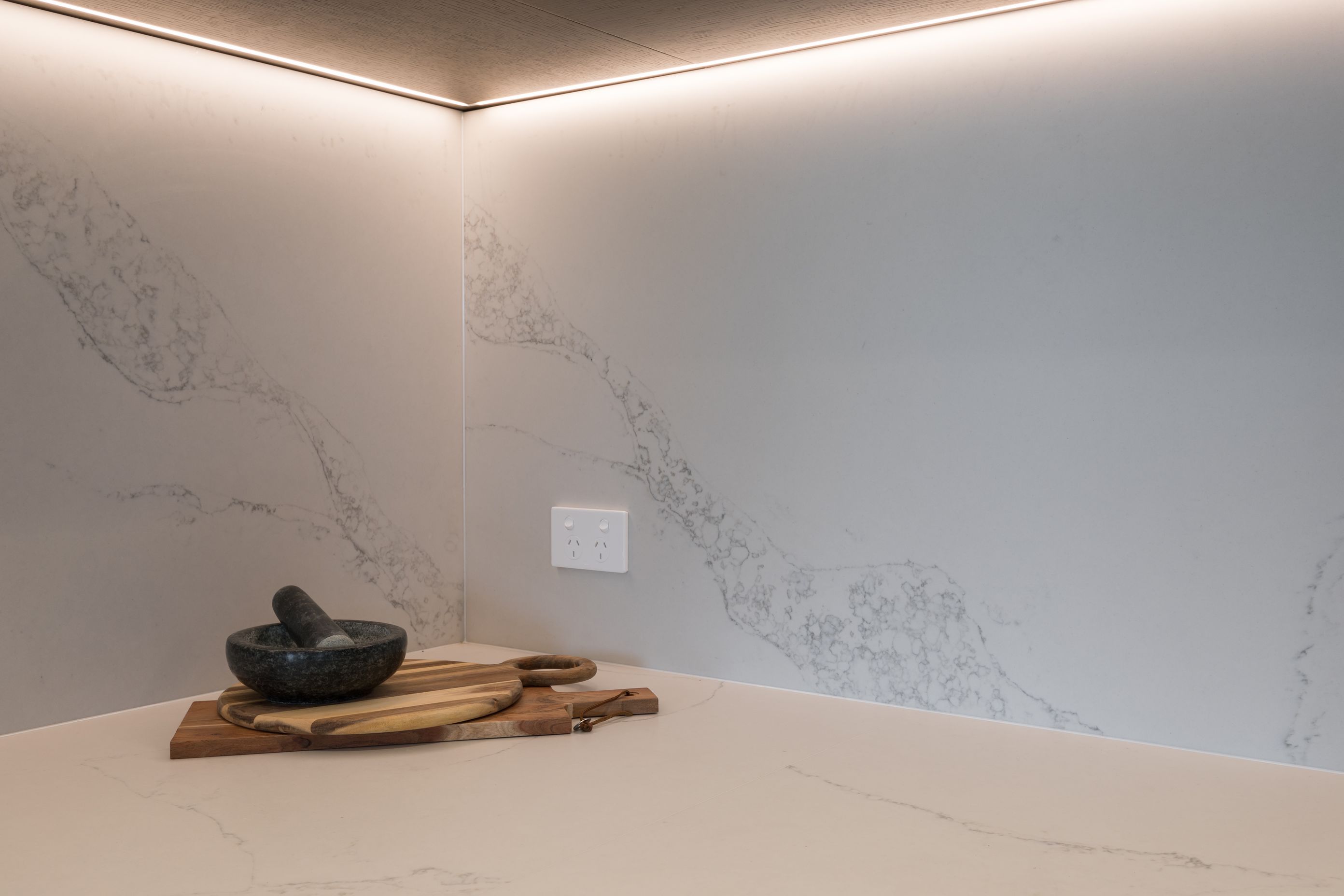 Prime Stone, Calacatta Formosa - Honed / Prime Veneer, American White Oak - Quarter Cut. Design by Susan Lands, Stratford Interior Design.