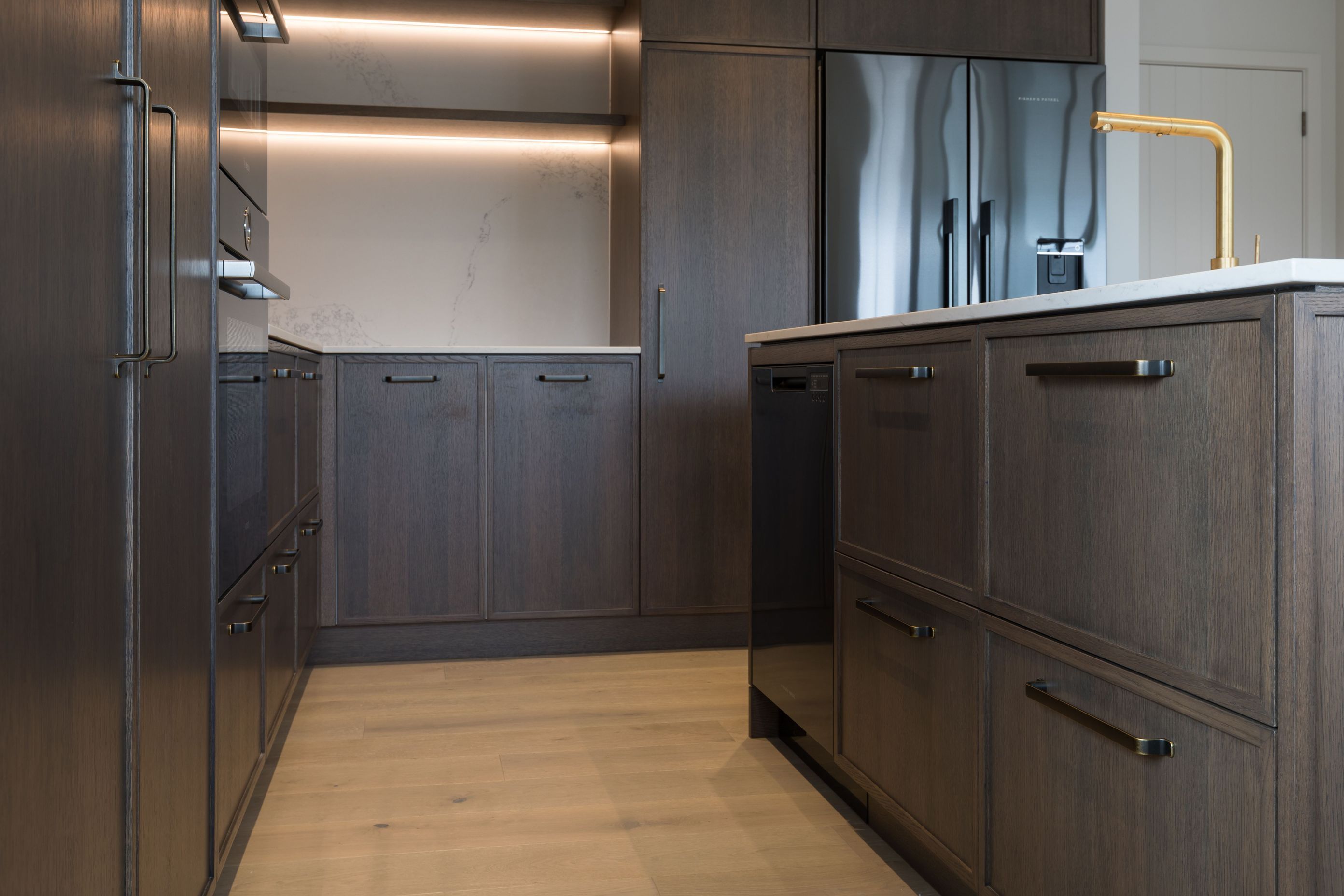 Prime Stone, Calacatta Formosa - Honed / Prime Veneer, American White Oak - Quarter Cut. Design by Susan Lands, Stratford Interior Design.