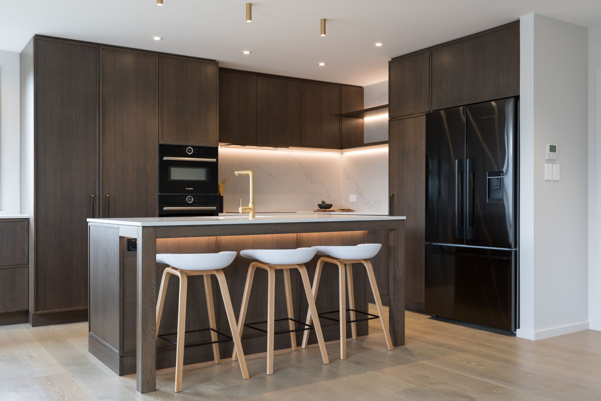 Prime Stone, Calacatta Formosa - Honed / Prime Veneer, American White Oak - Quarter Cut. Design by Susan Lands, Stratford Interior Design.