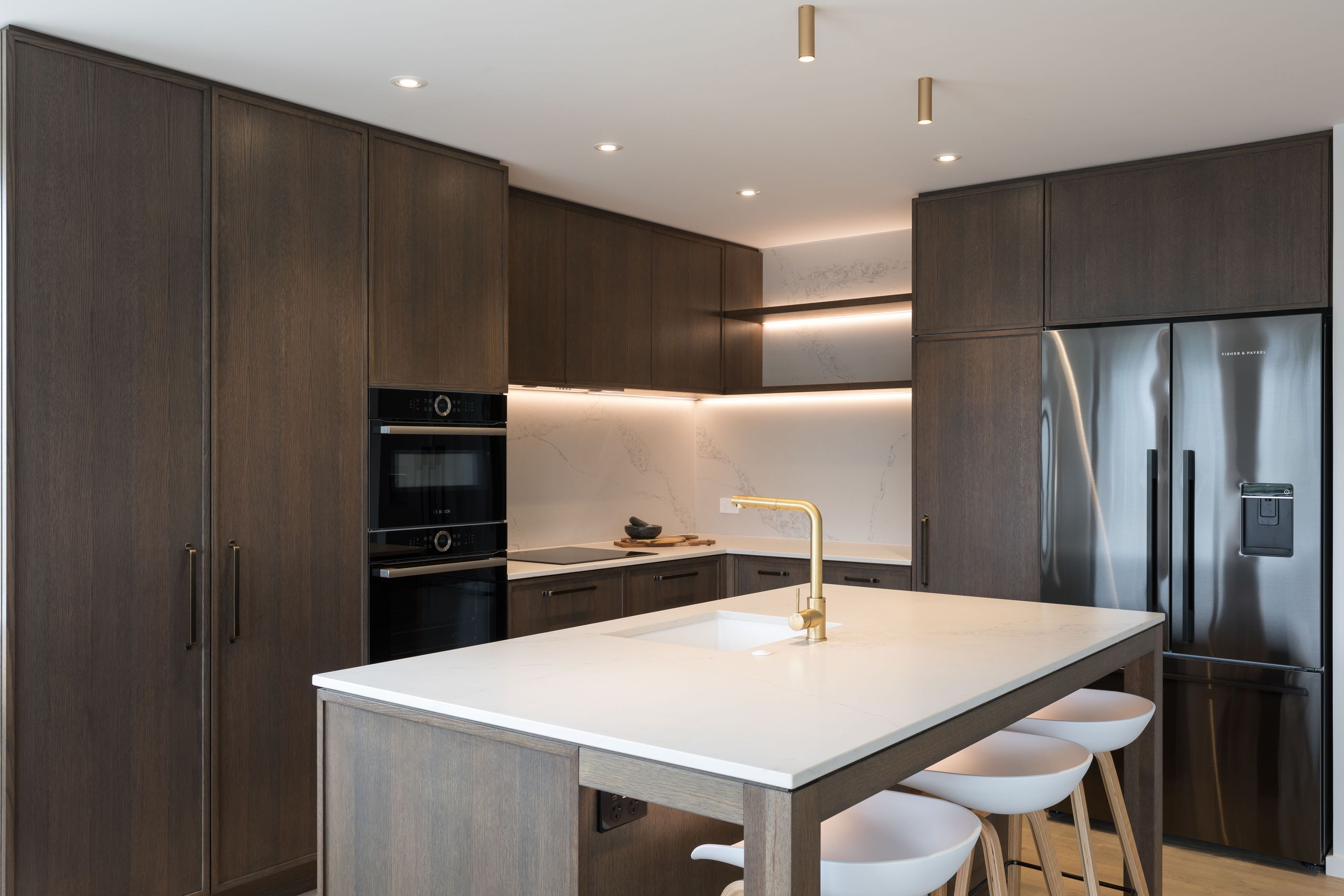Prime Stone, Calacatta Formosa - Honed / Prime Veneer, American White Oak - Quarter Cut. Design by Susan Lands, Stratford Interior Design.