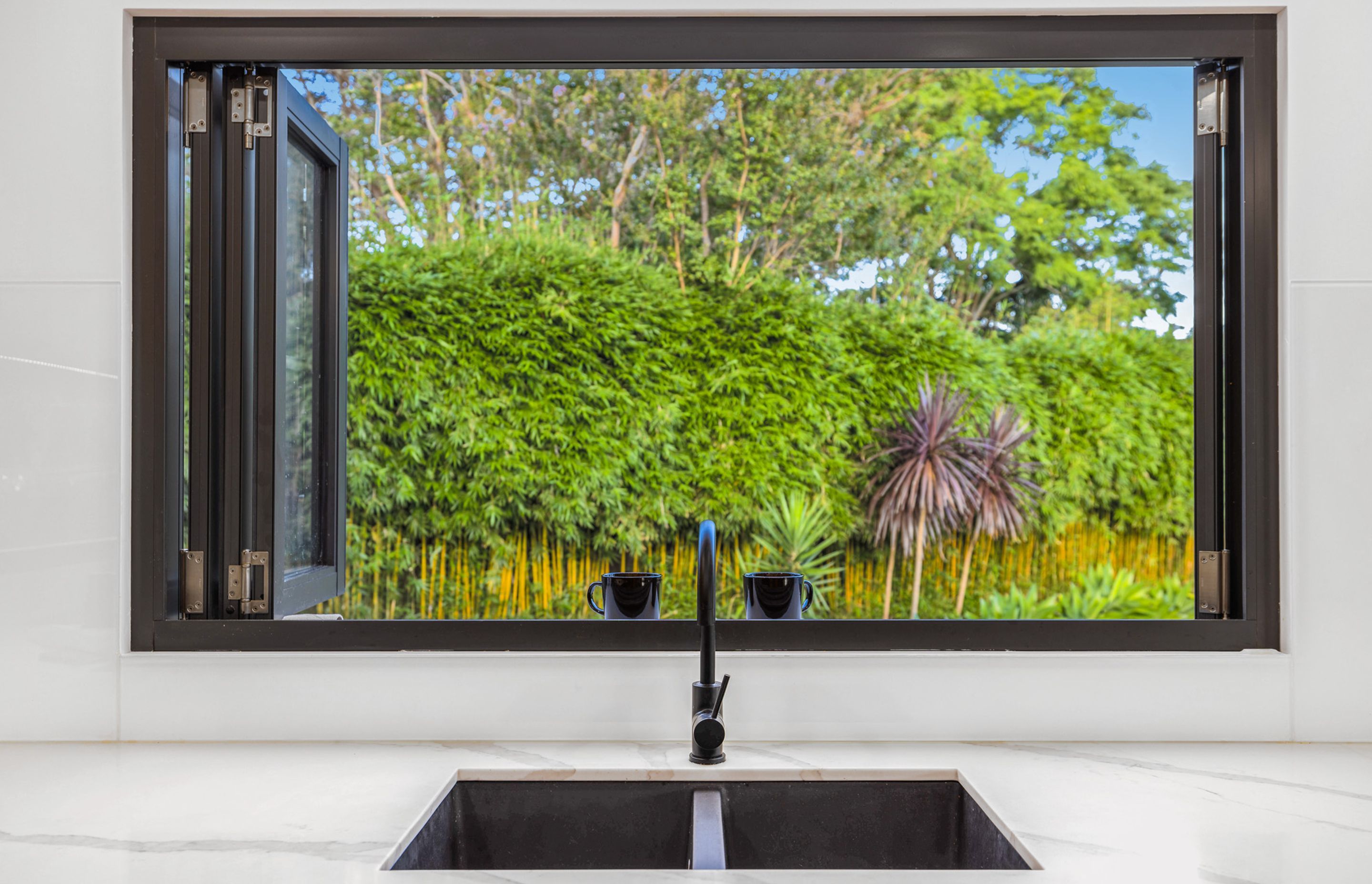 Kitchen: Platinum Quartz Carbon Black 790 Double bowl sink and Platinum Gooseneck tapware.