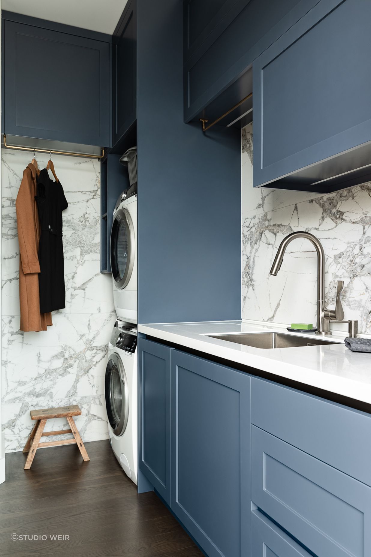 A design feature Toni created to the tiled walls behind the rails is heated pads to air delicates out of the rain.