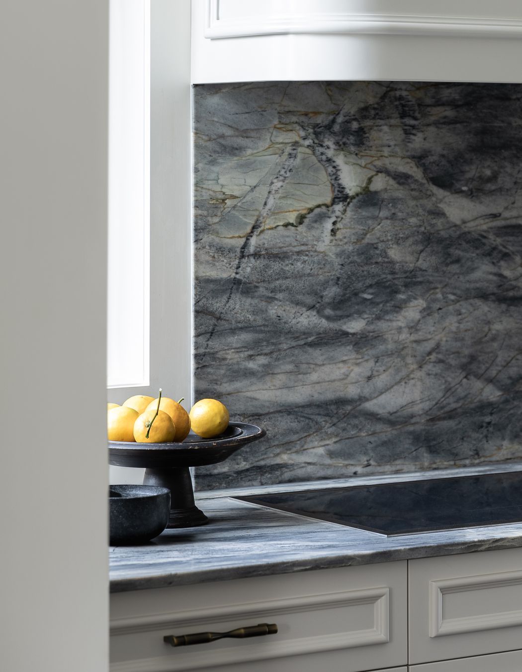 The kitchen transformation showcases a visually stunning, richly detailed and highly functional space for the homeowners.