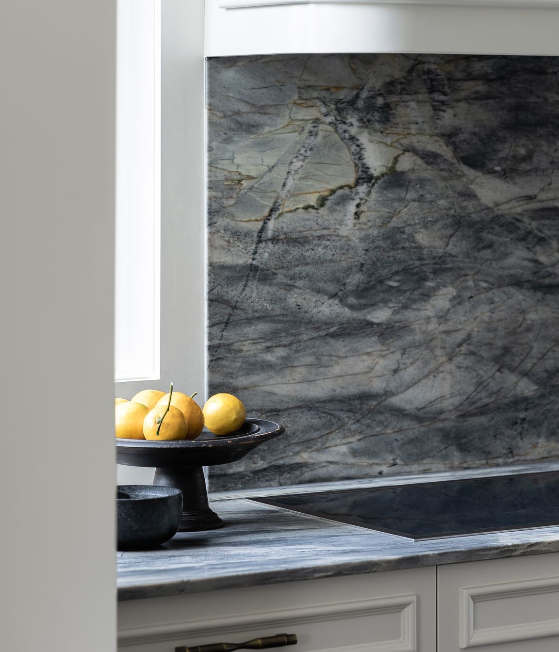 The kitchen transformation showcases a visually stunning, richly detailed and highly functional space for the homeowners.