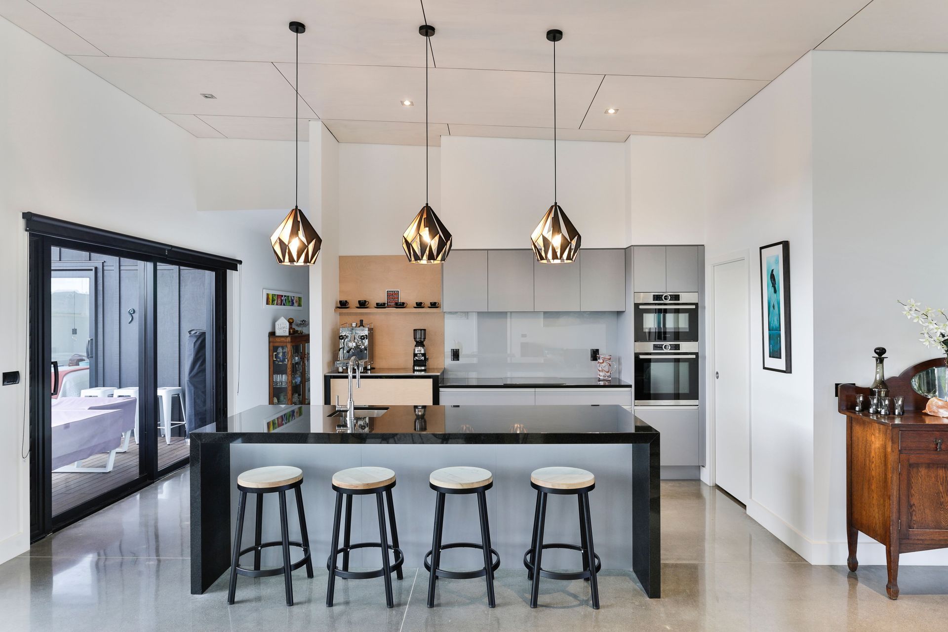 Cabinetry at back: Bestwood Melamine in Silver Haze,  Kitchen Design by Christine Dawson, Mastercraft Kitchens, BOP.
