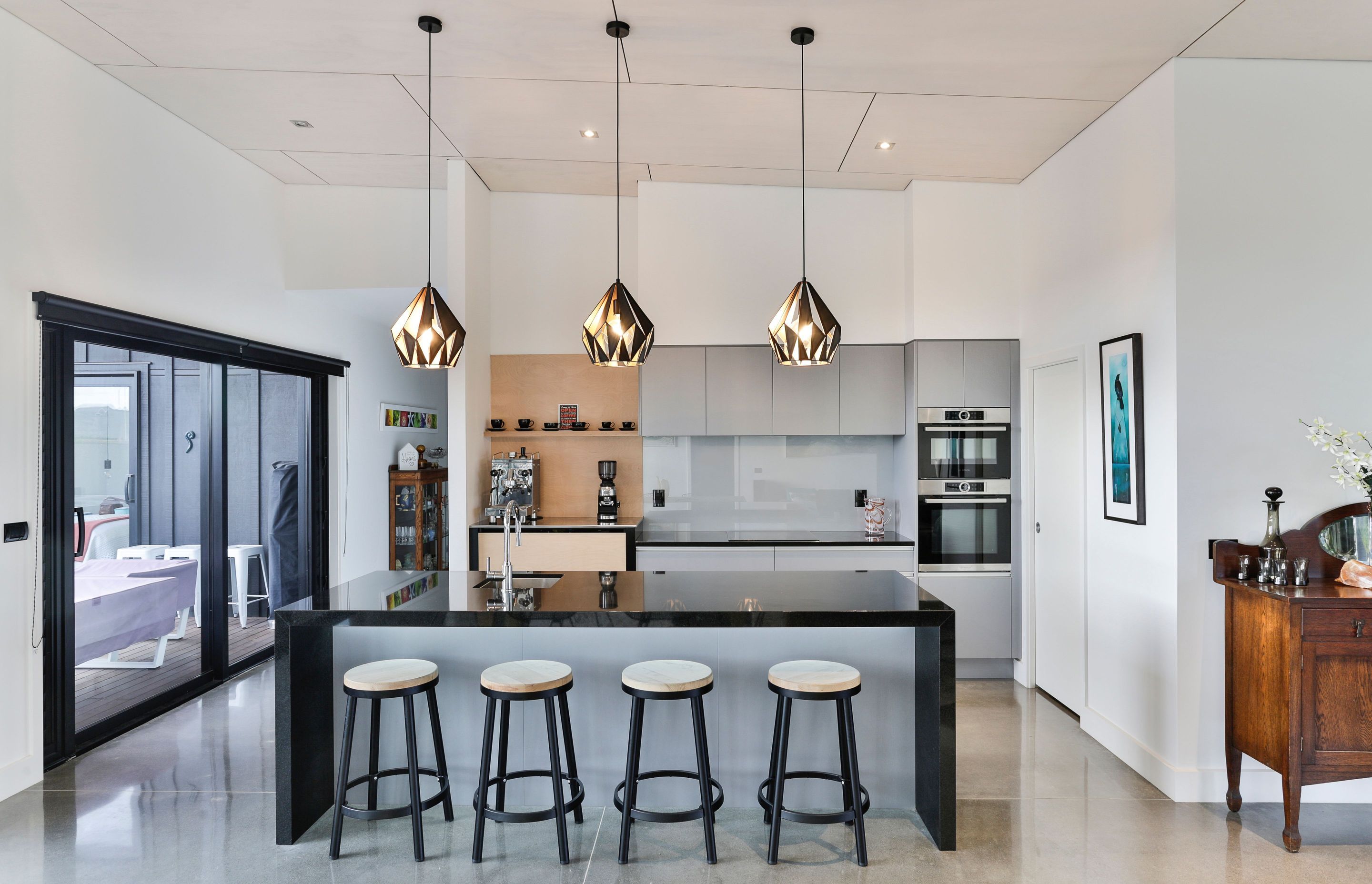 Cabinetry at back: Bestwood Melamine in Silver Haze,  Kitchen Design by Christine Dawson, Mastercraft Kitchens, BOP.