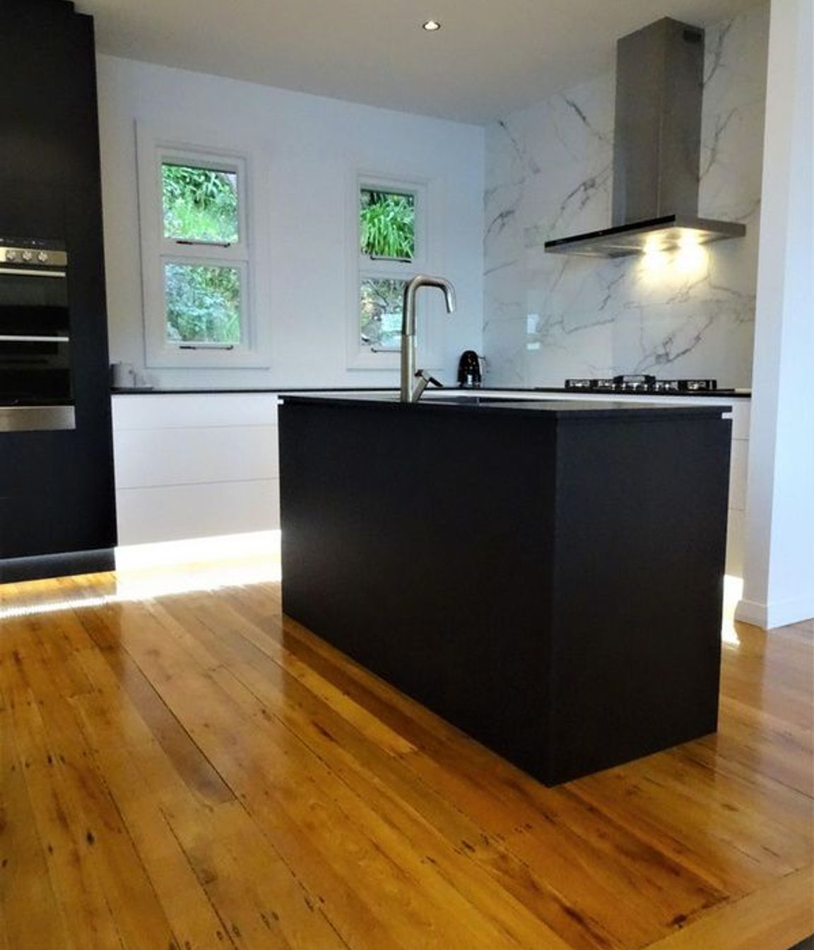 Statement black kitchen island joinery