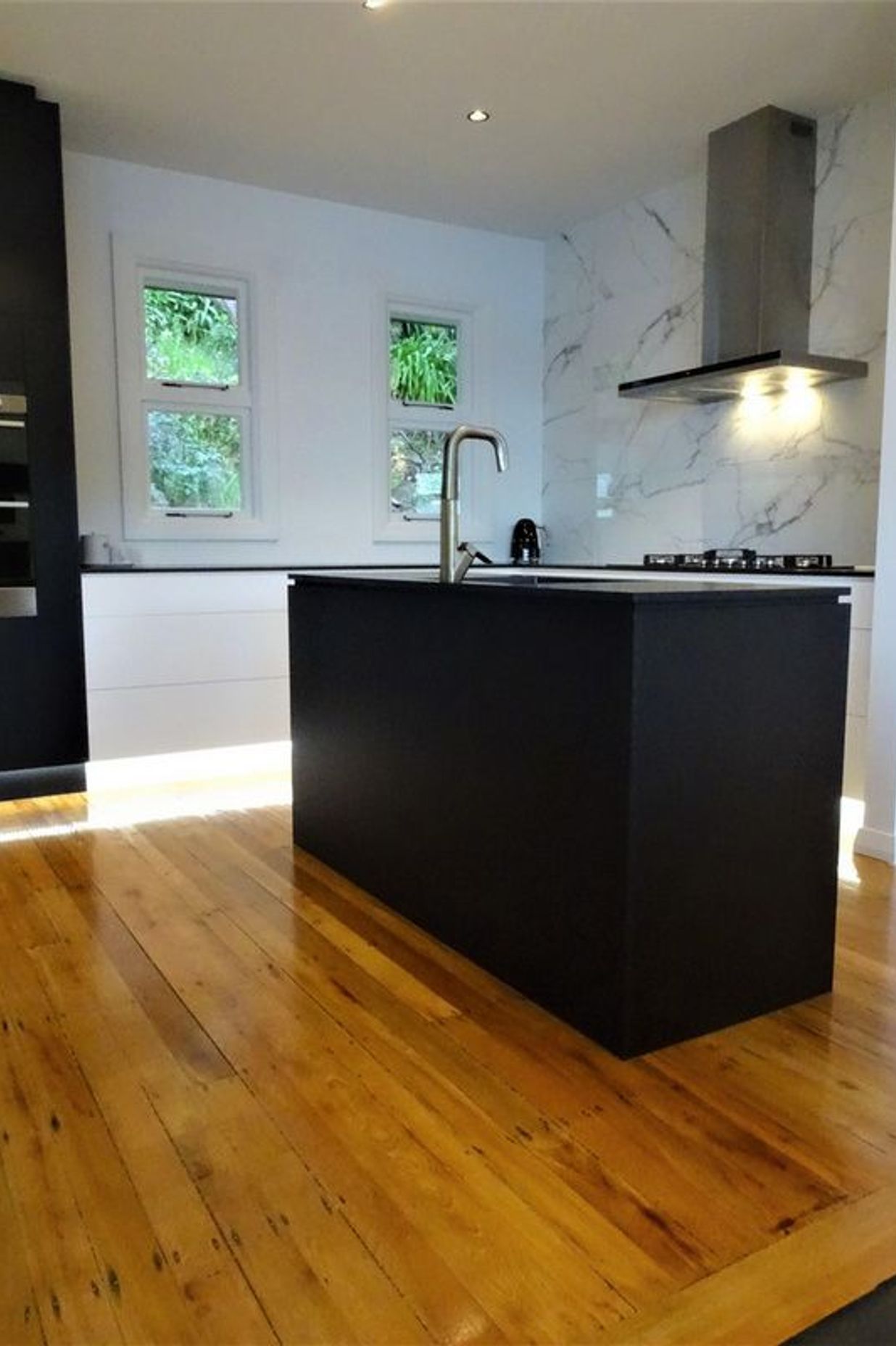 Statement black kitchen island joinery