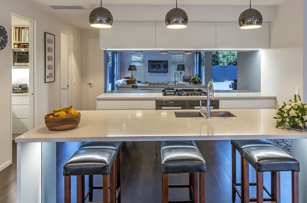 Stylish Kitchen Uses Hidden Handles