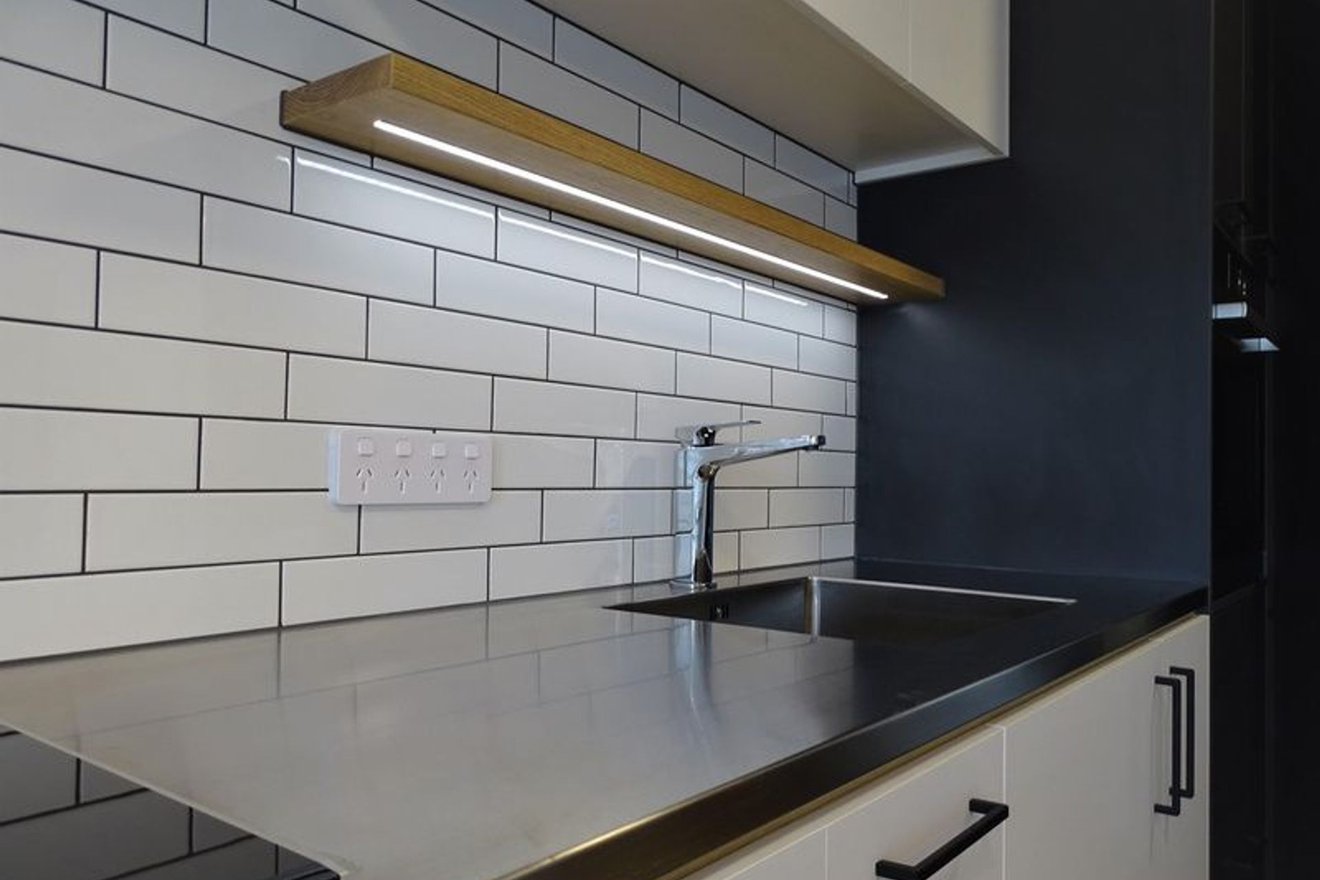 Stylish light feature over the kitchen sink