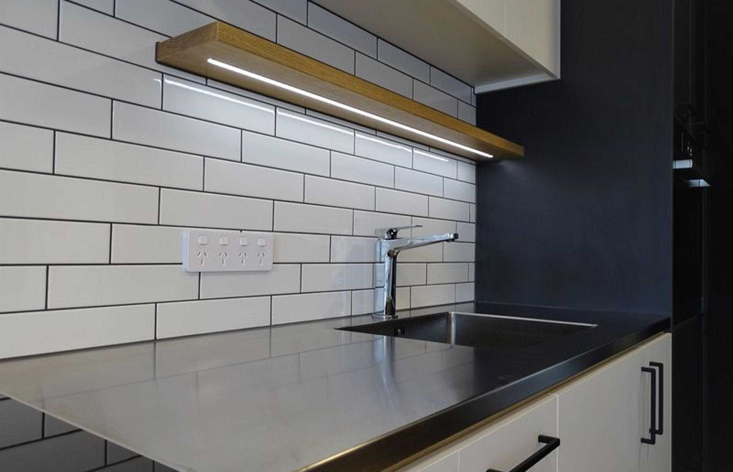 Stylish light feature over the kitchen sink