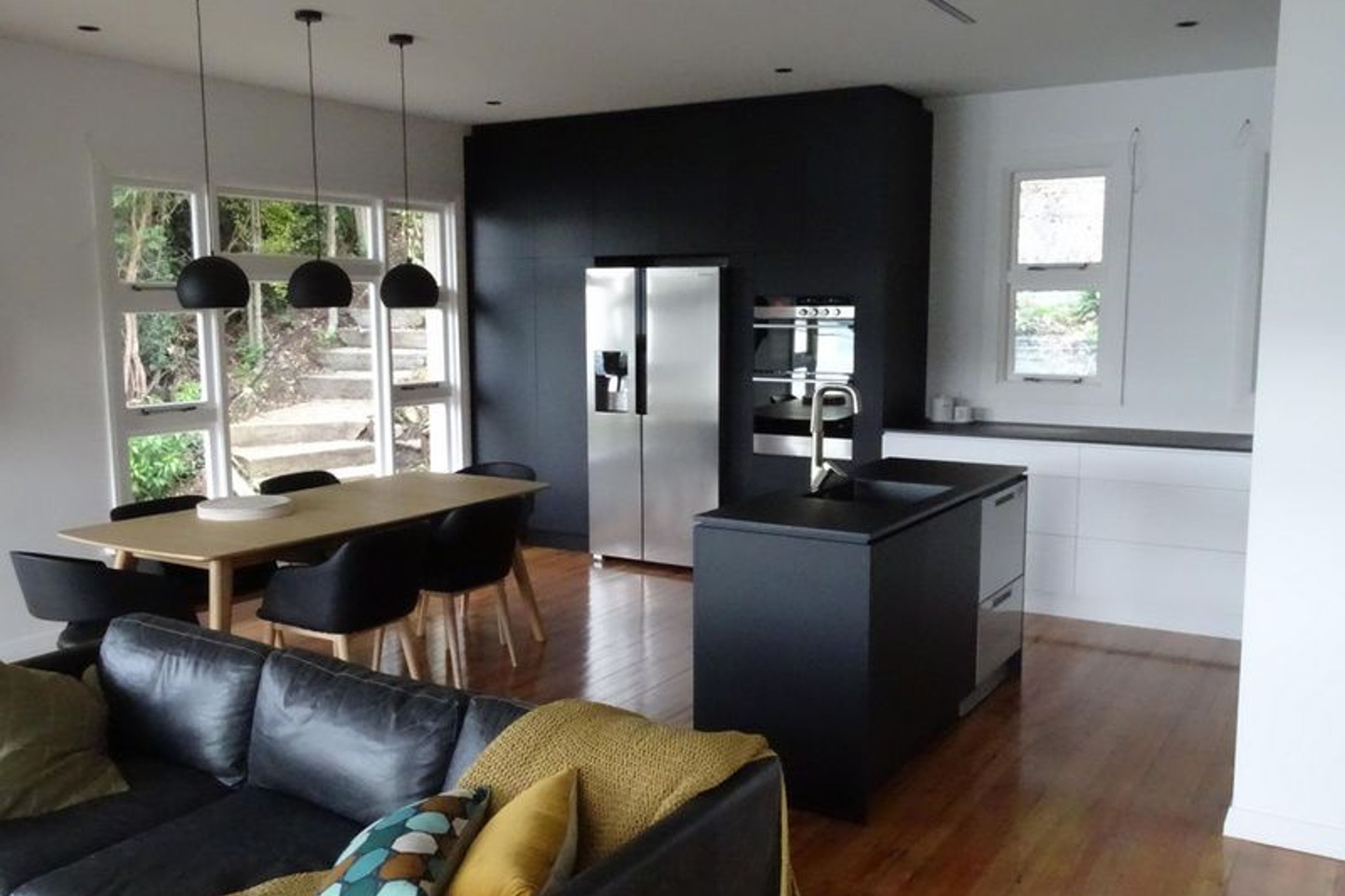 The kitchen from the lounge area works in well with the decor