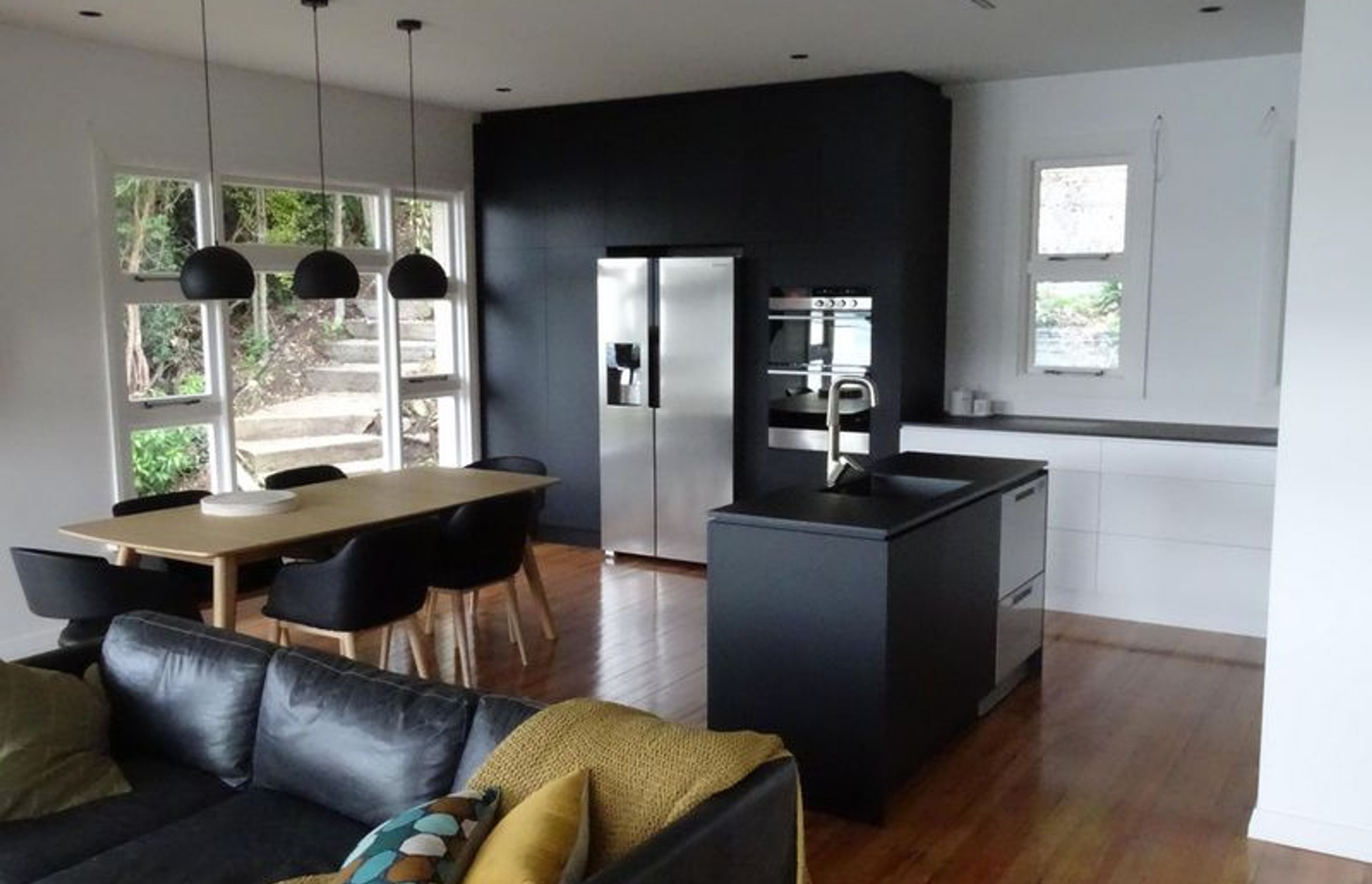 The kitchen from the lounge area works in well with the decor