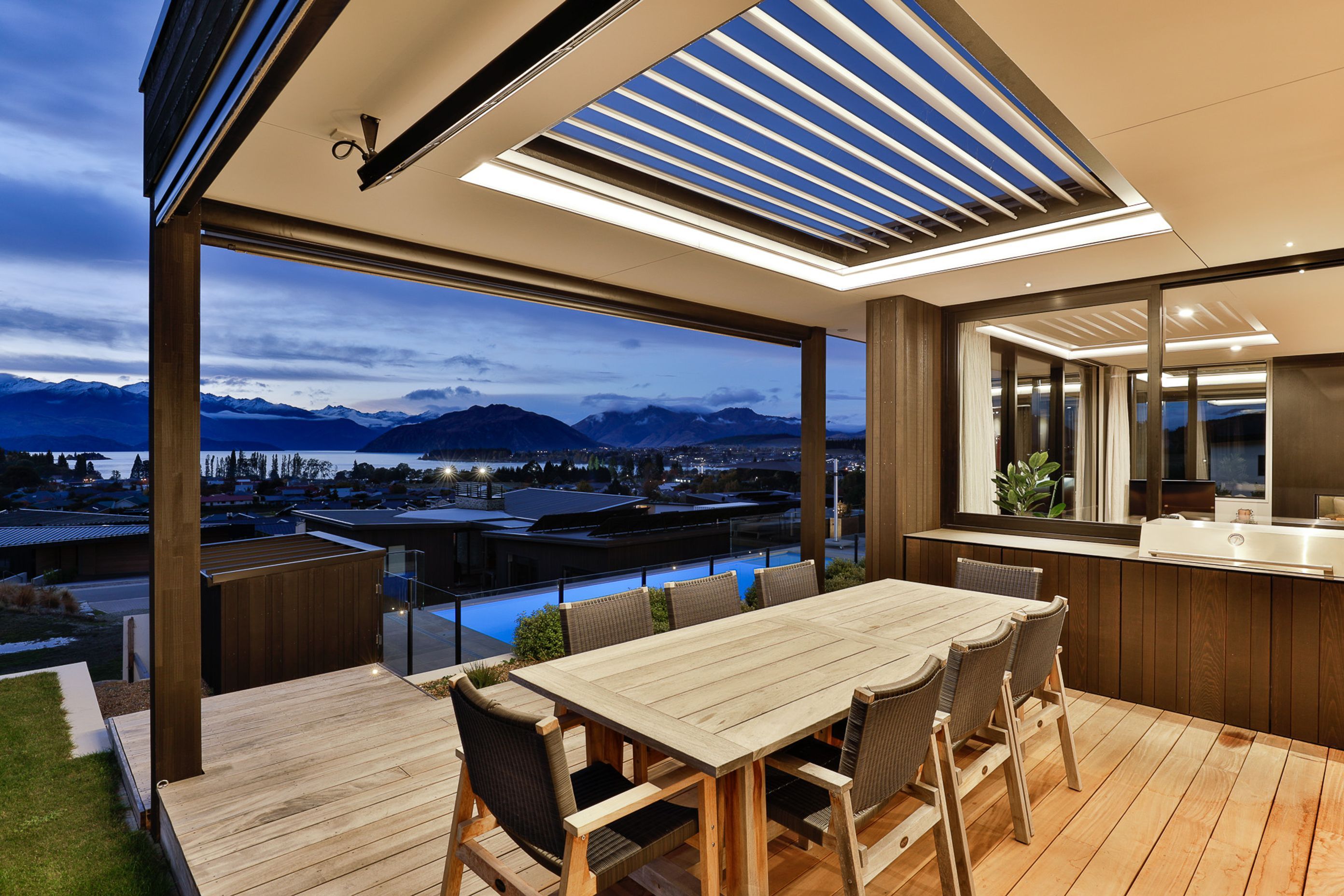 Outdoor Dining with built in BBQ and louvres overhead.  Interior Design- Kelly @ Archi Build Ltd.