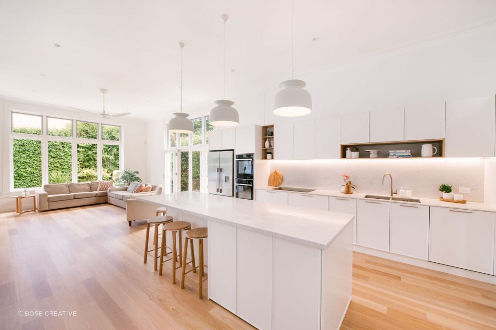 kitchen-design-sydney-luxury-kitchen-white-stone-bench-timber-floor-ornate-doors-01-1084x721.jpg
