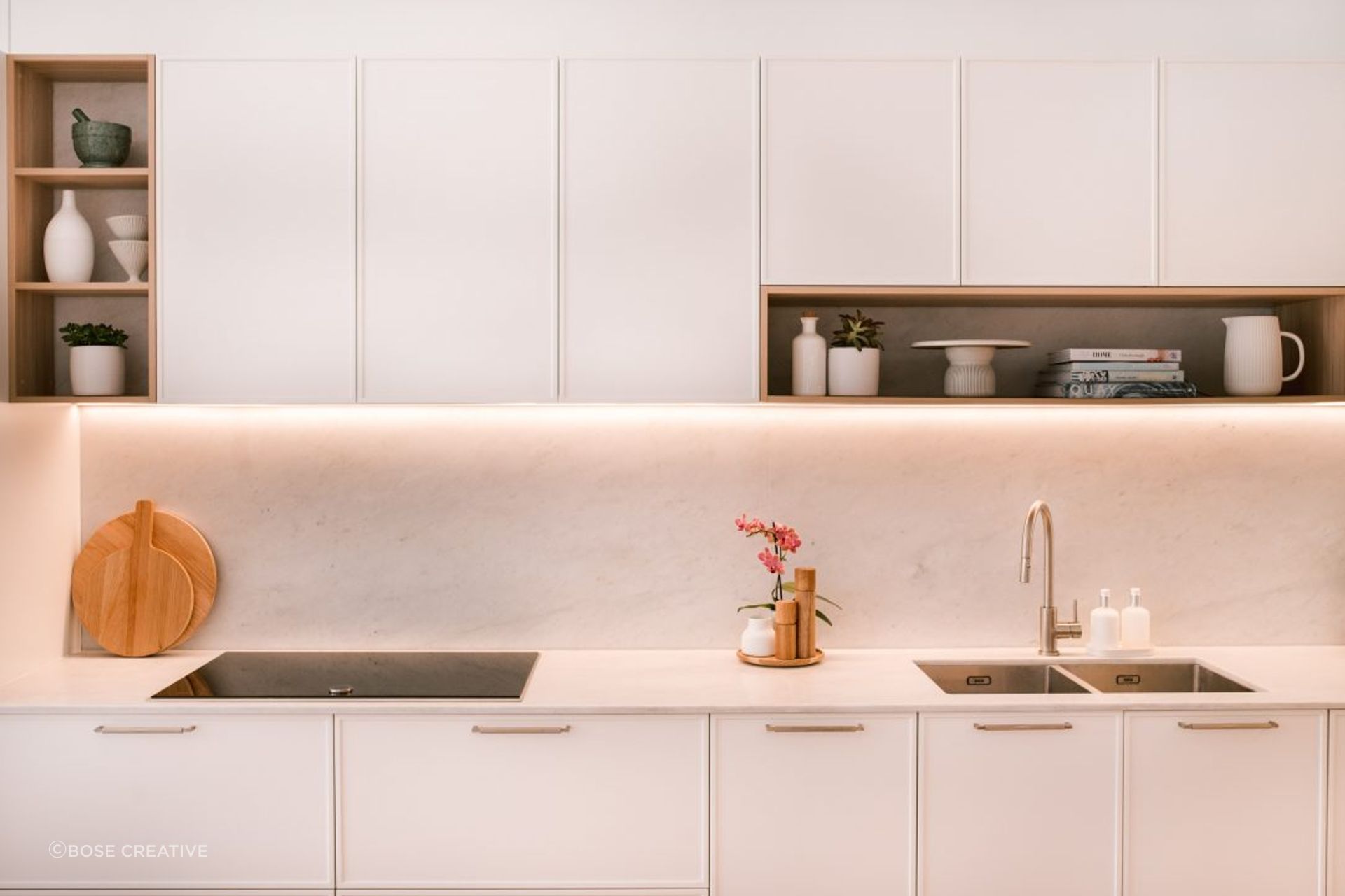 kitchen-design-sydney-luxury-kitchen-white-stone-bench-timber-floor-ornate-doors-03-1084x721.jpg