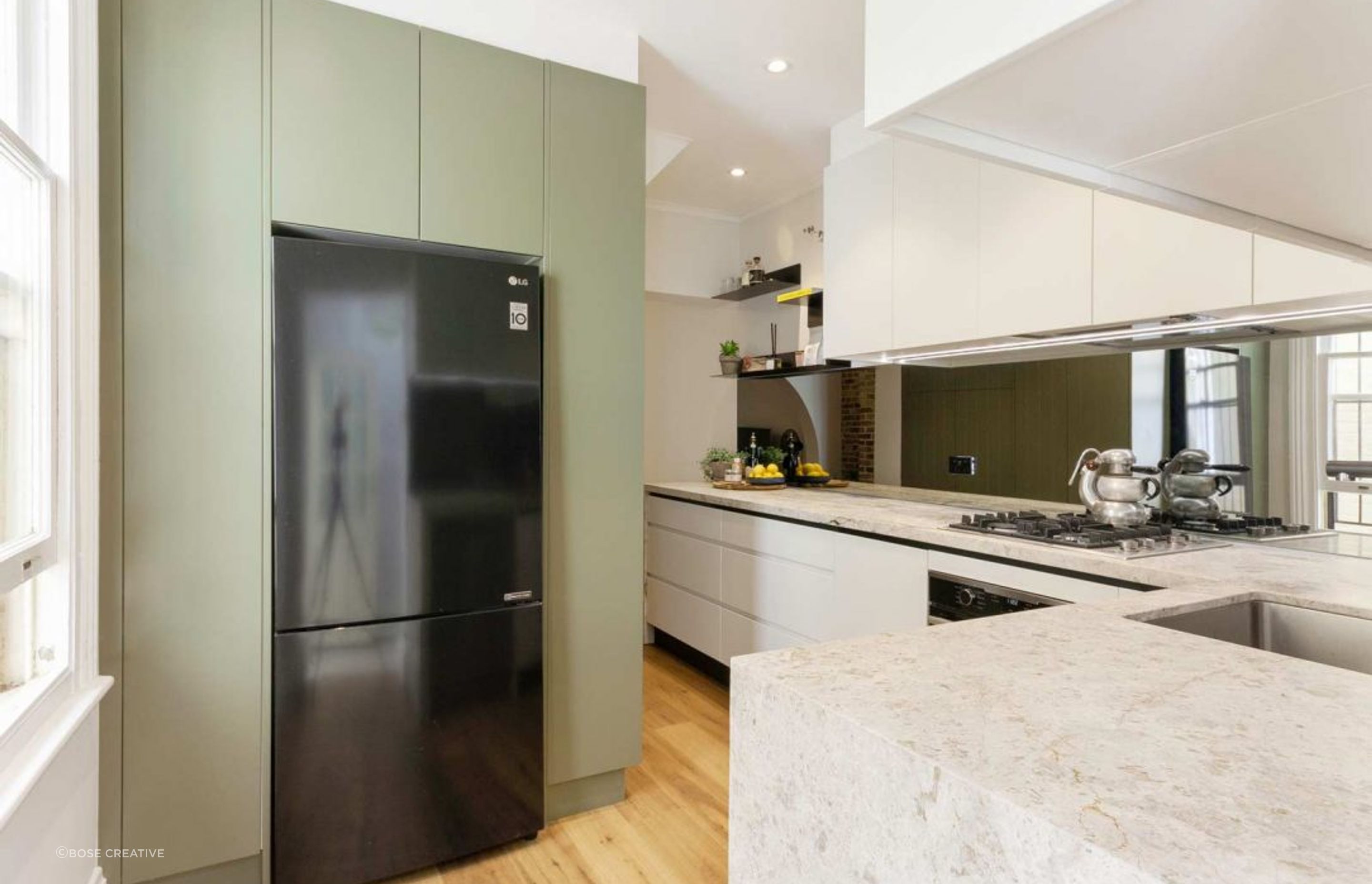 kitchen-design-sydney-modern-dulux-green-v-groove-limestone-benchtop-premier-kitchens-australia-05-1084x723.jpg