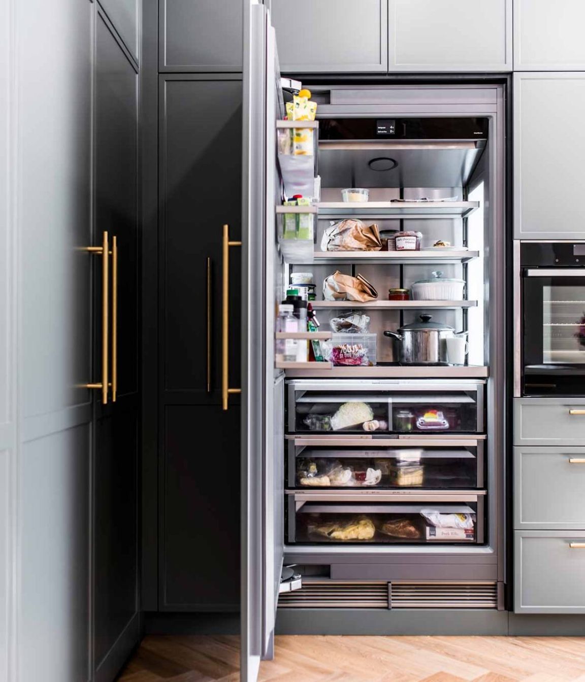 modern-luxury-kitchen-design-premier-kitchens-stone-benchtop-renovations-neff-appliances-11-liebherr-monolith-fridge-1084x1629.jpg