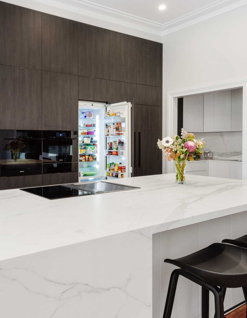 premier-kitchen-design-sydney-neolith-dekton-benchtop-splashback-integrated-fridge-1084x1626.jpg