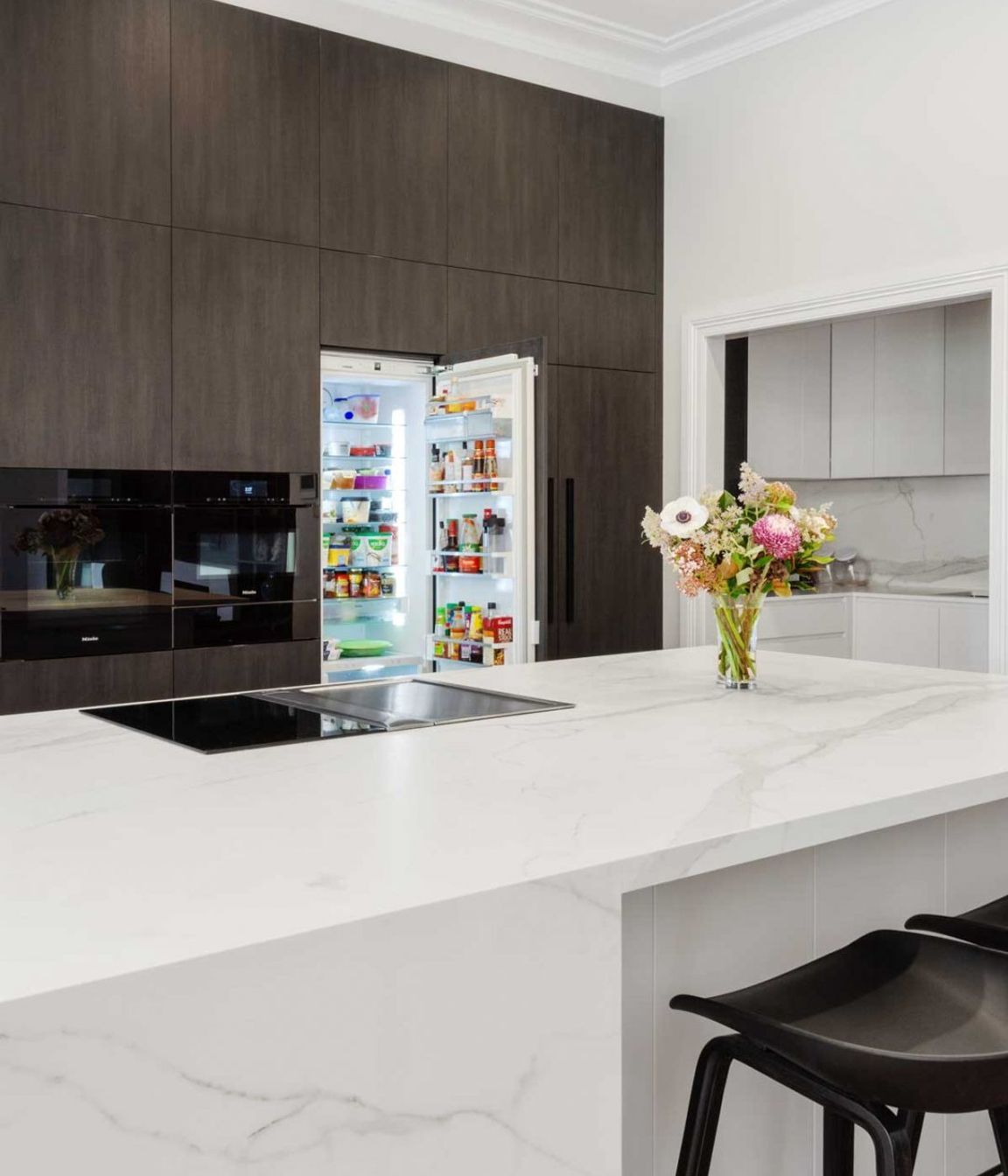premier-kitchen-design-sydney-neolith-dekton-benchtop-splashback-integrated-fridge-1084x1626.jpg