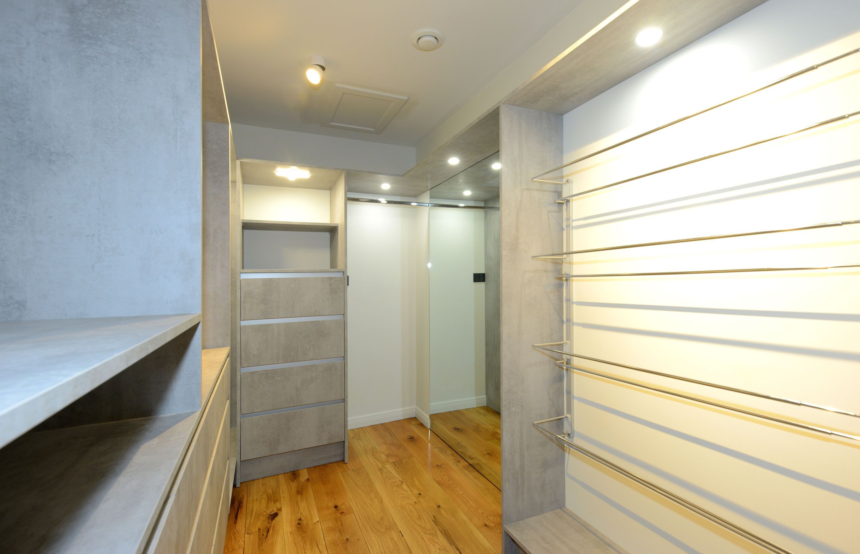 Great Storage in The Wardrobe or Dressing Room, with Ritma Soft Close Drawers in the Background and, on the Left, Ambos Shoe Racks.