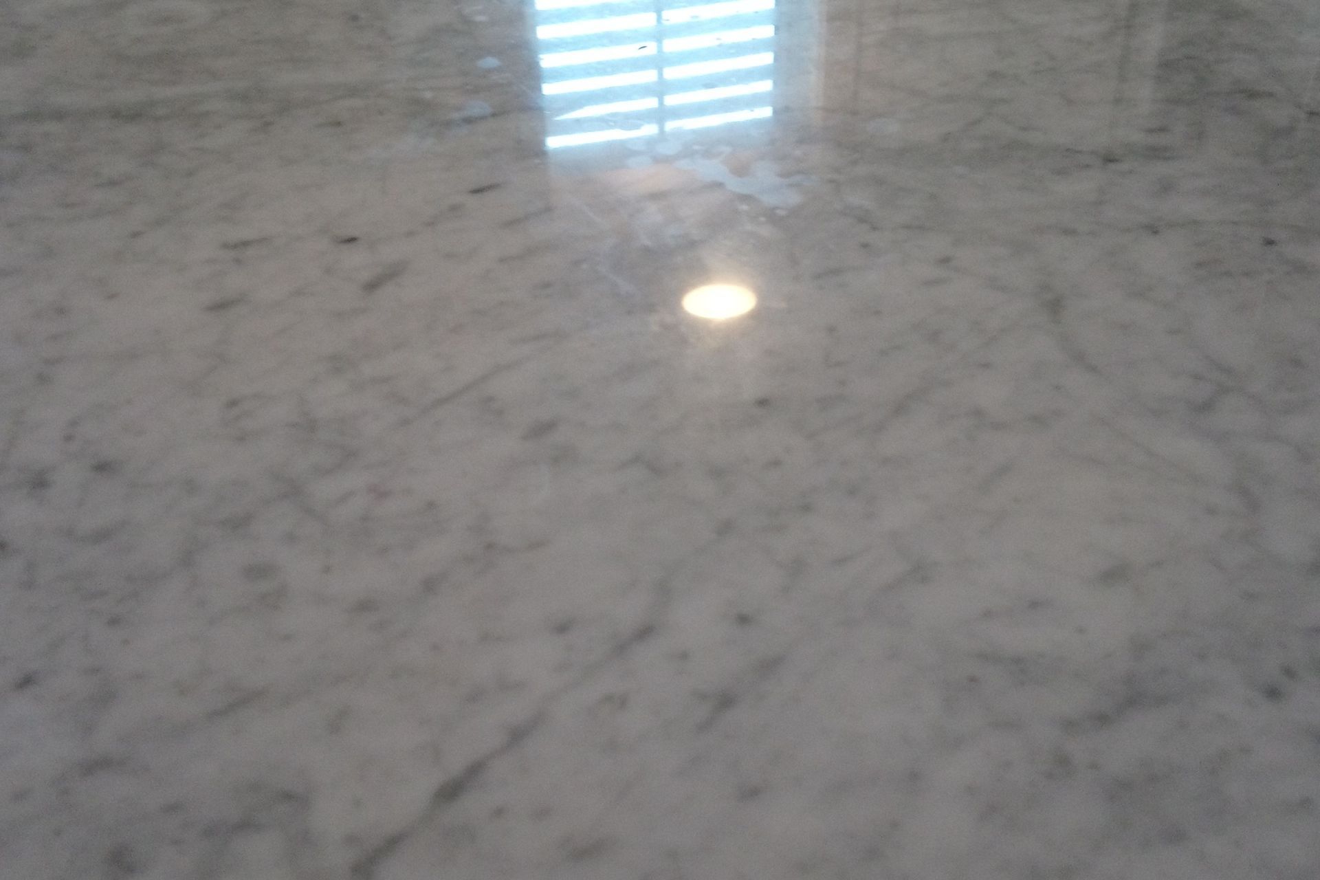 Carrara marble benchtop restoration and stone protection