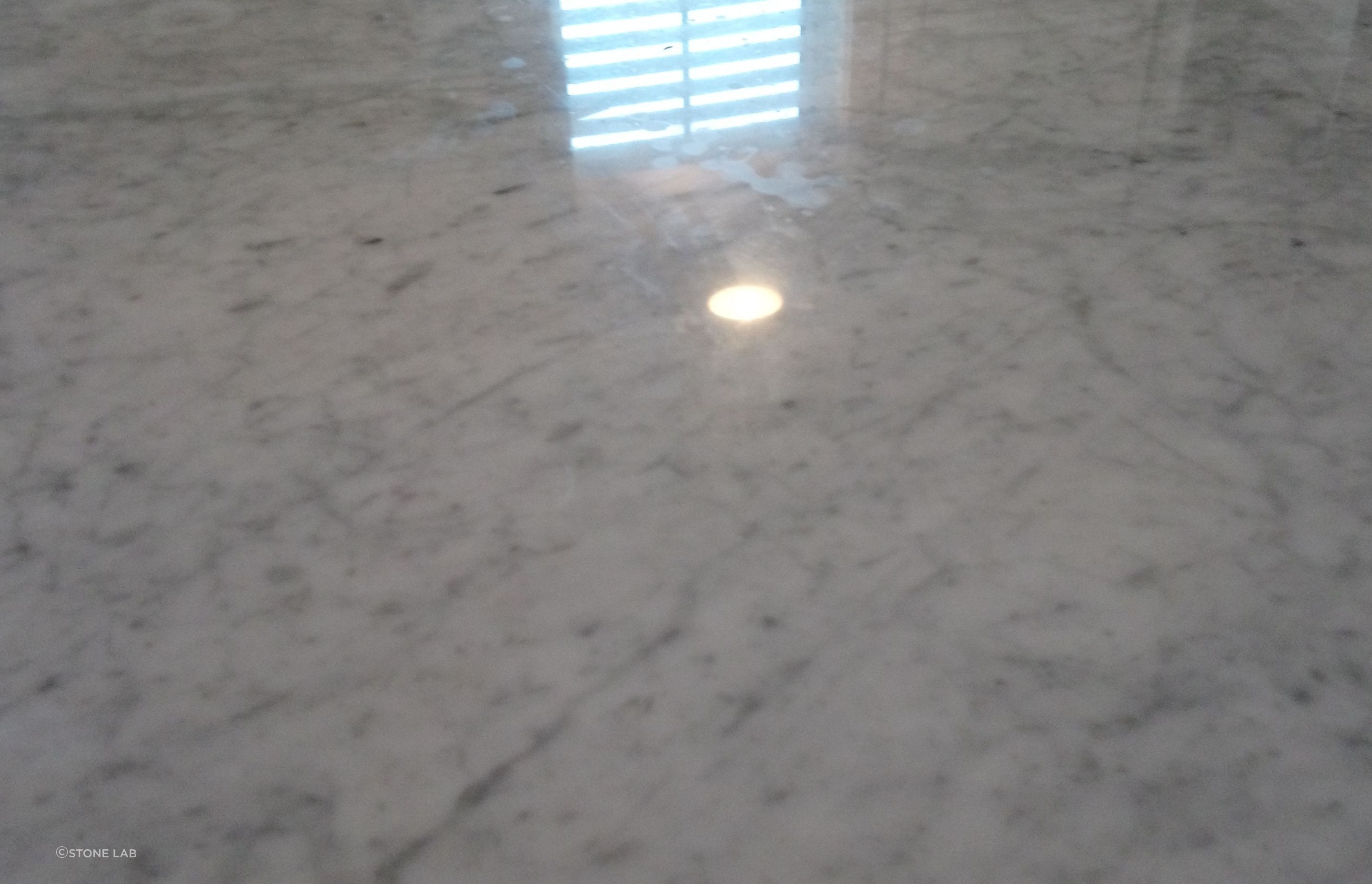Carrara marble benchtop restoration and stone protection