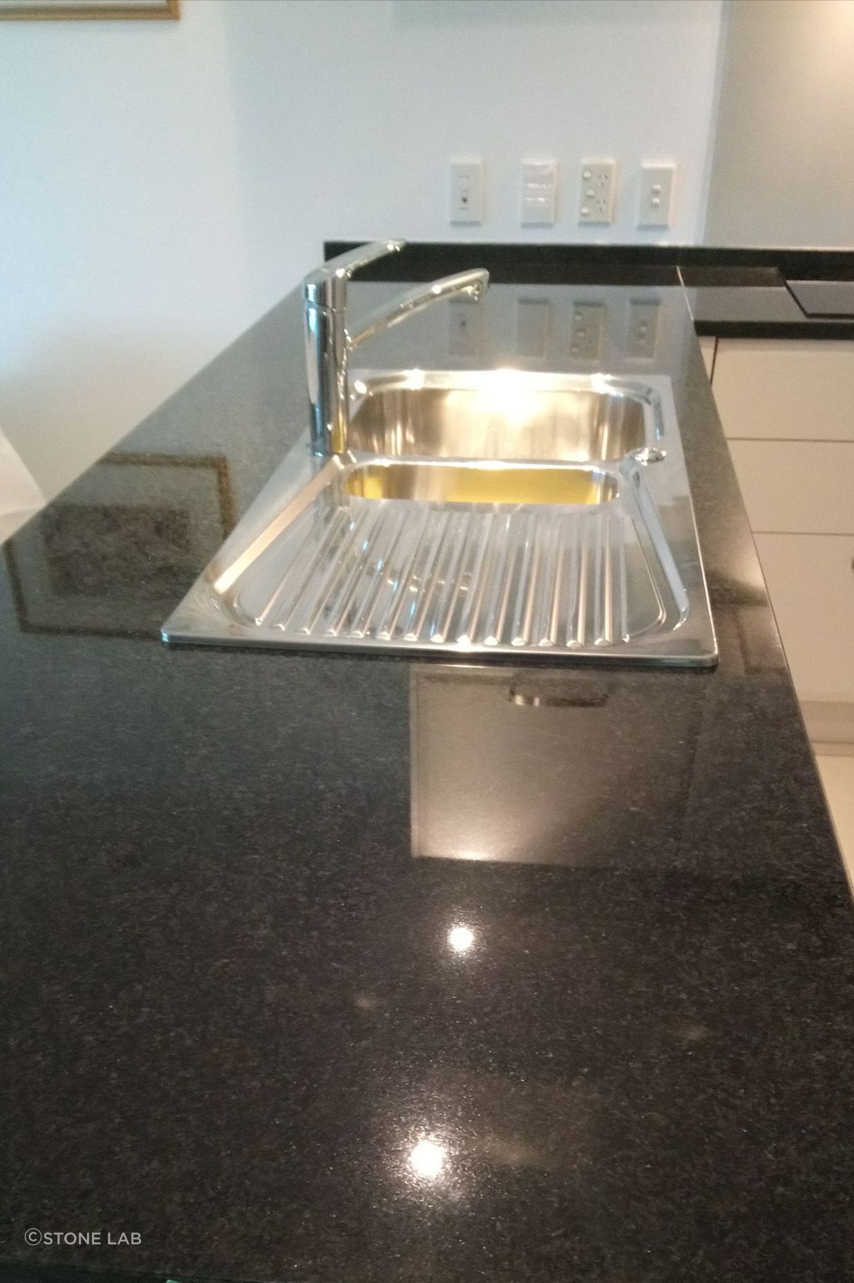 Stone benchtop polish restoration