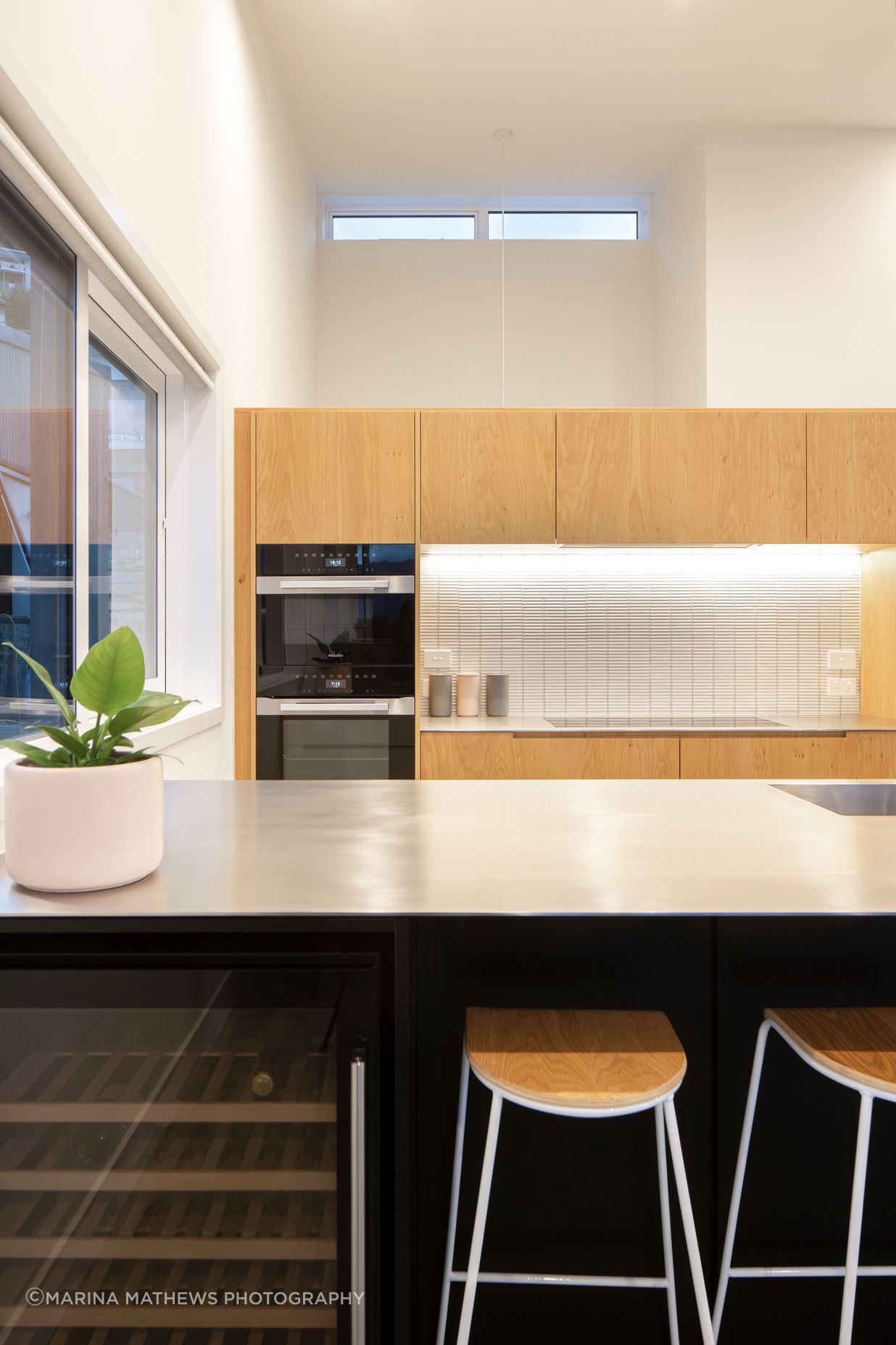 Bespoke kitchen joinery with high level glazing at the rear