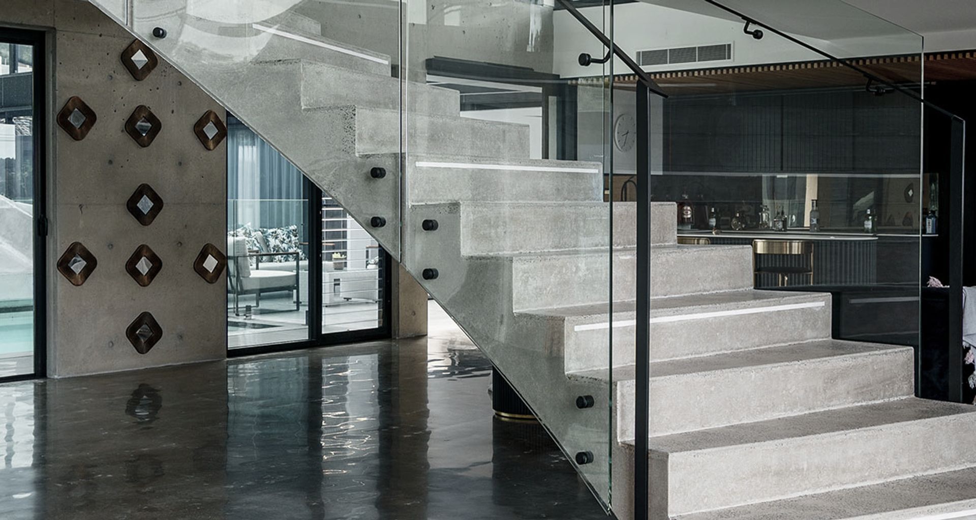 The Esplanade – Twin Bent Glass Curved Staircase banner