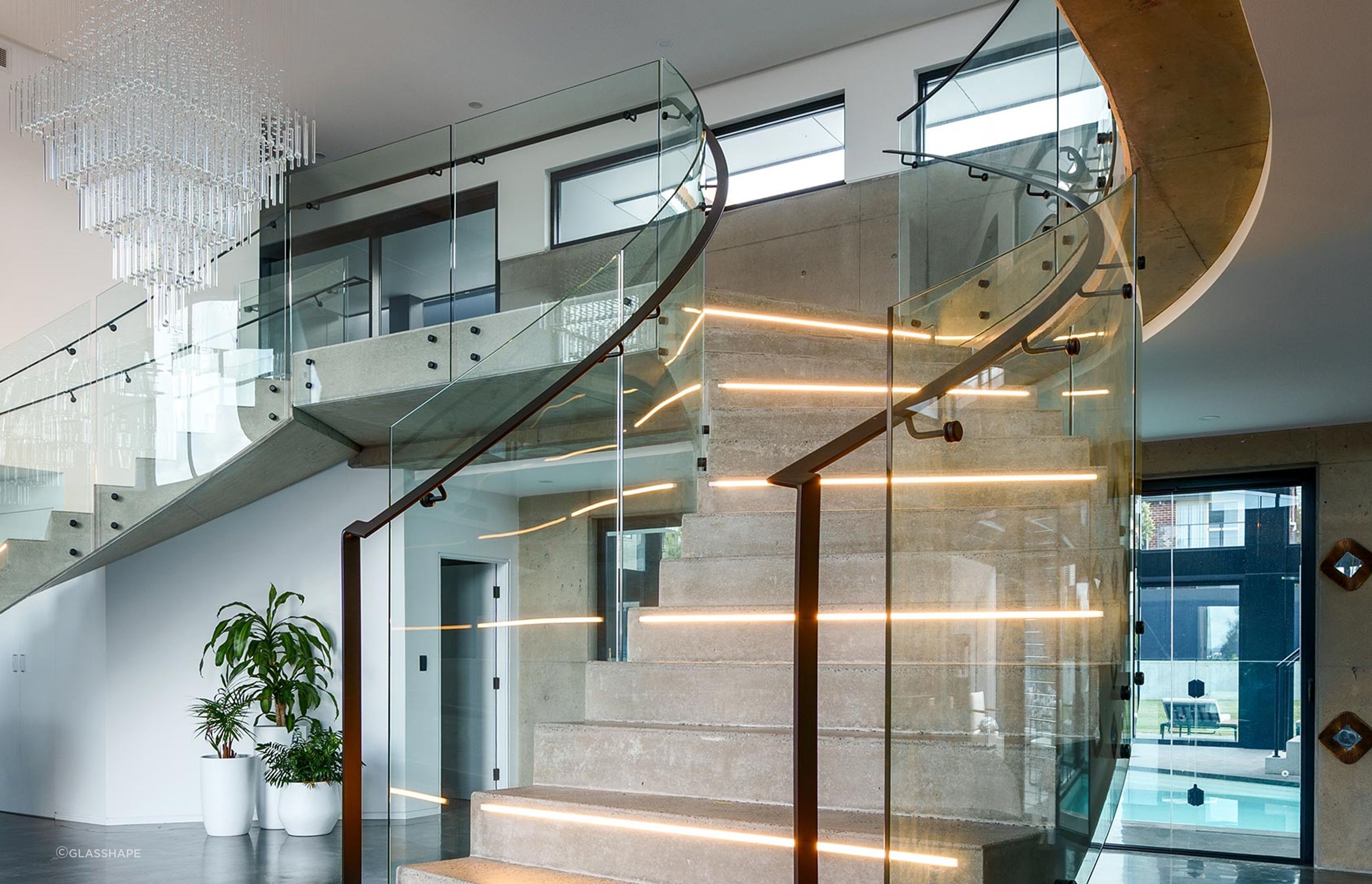 The Esplanade – Twin Bent Glass Curved Staircase