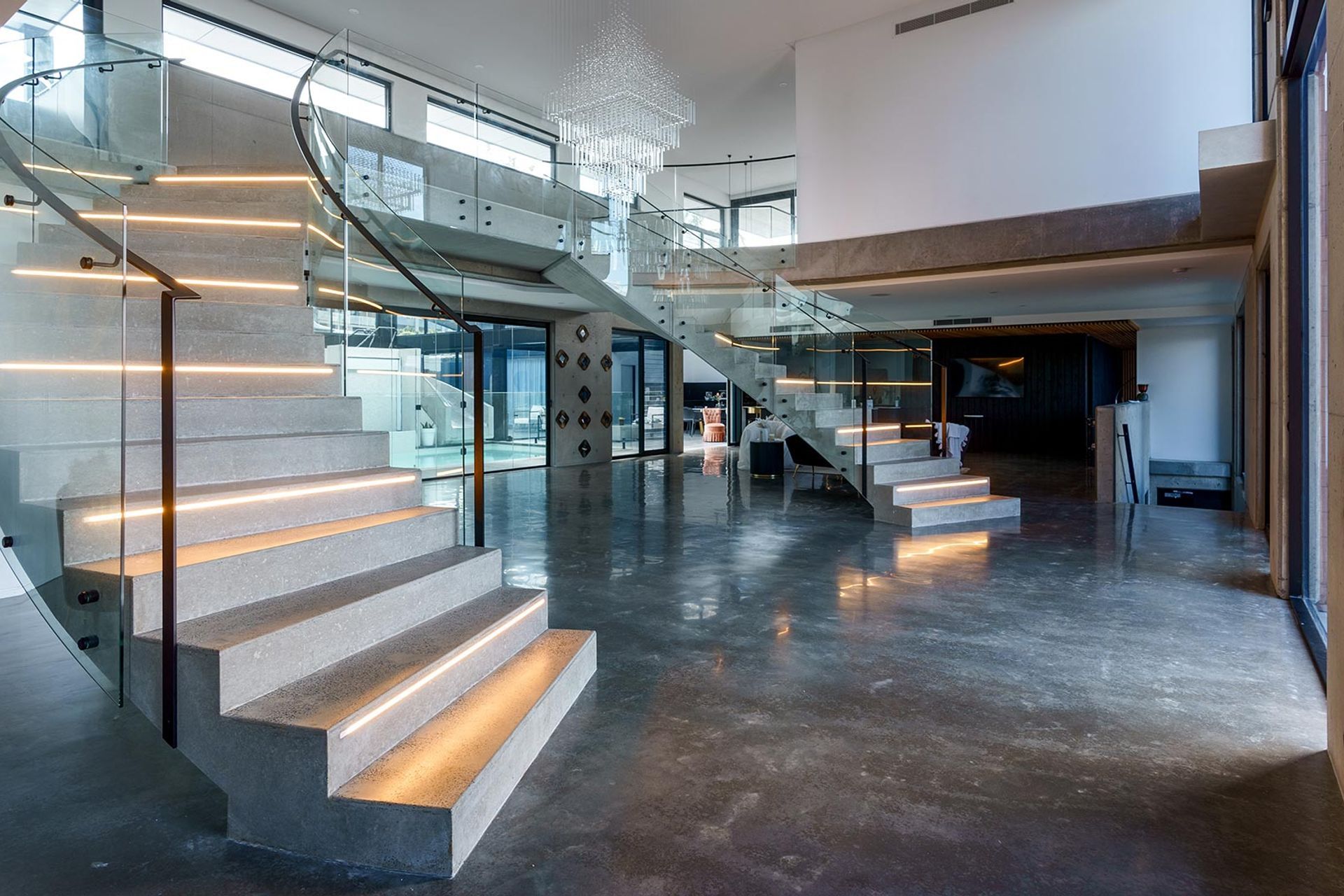 The Esplanade – Twin Bent Glass Curved Staircase