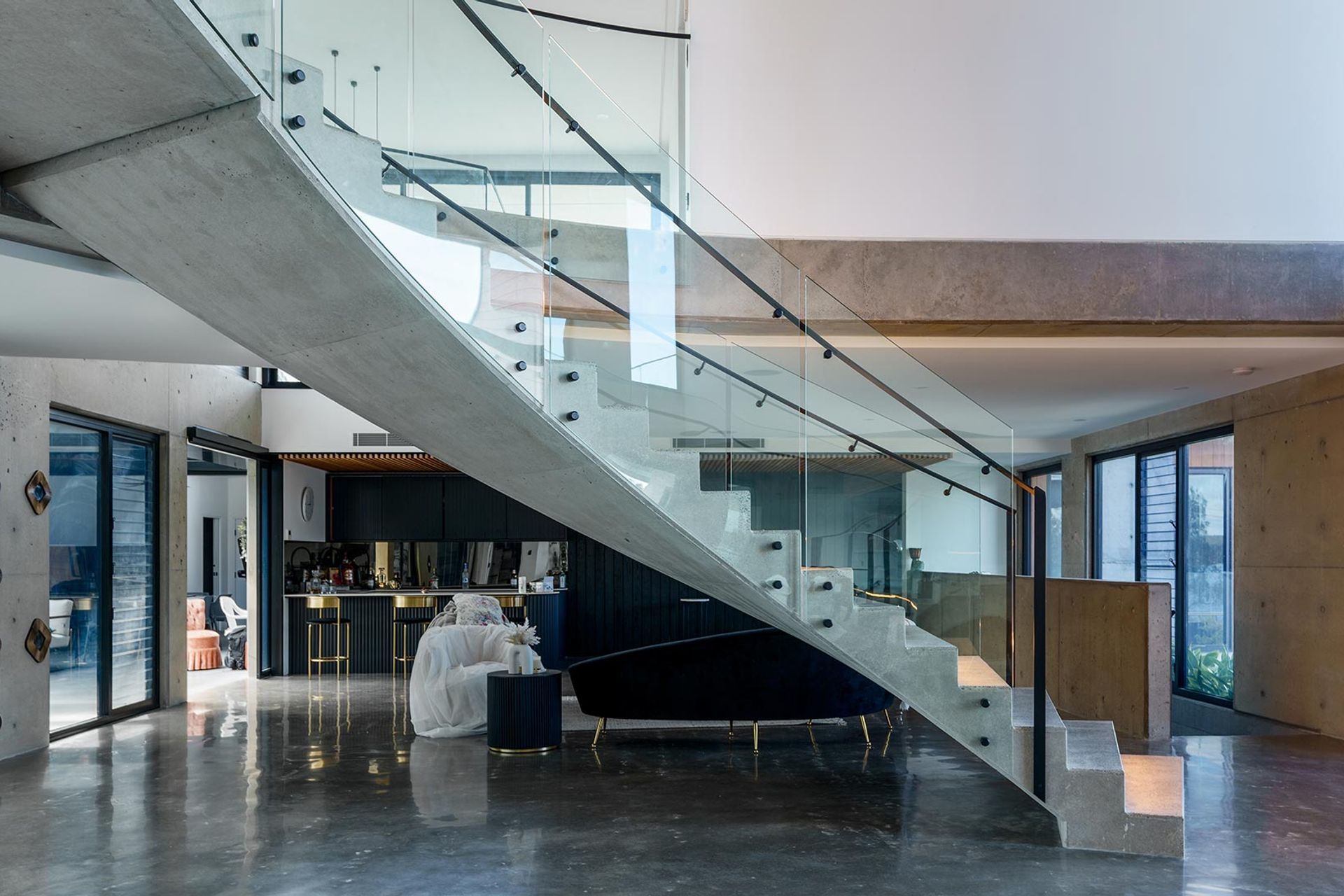 The Esplanade – Twin Bent Glass Curved Staircase