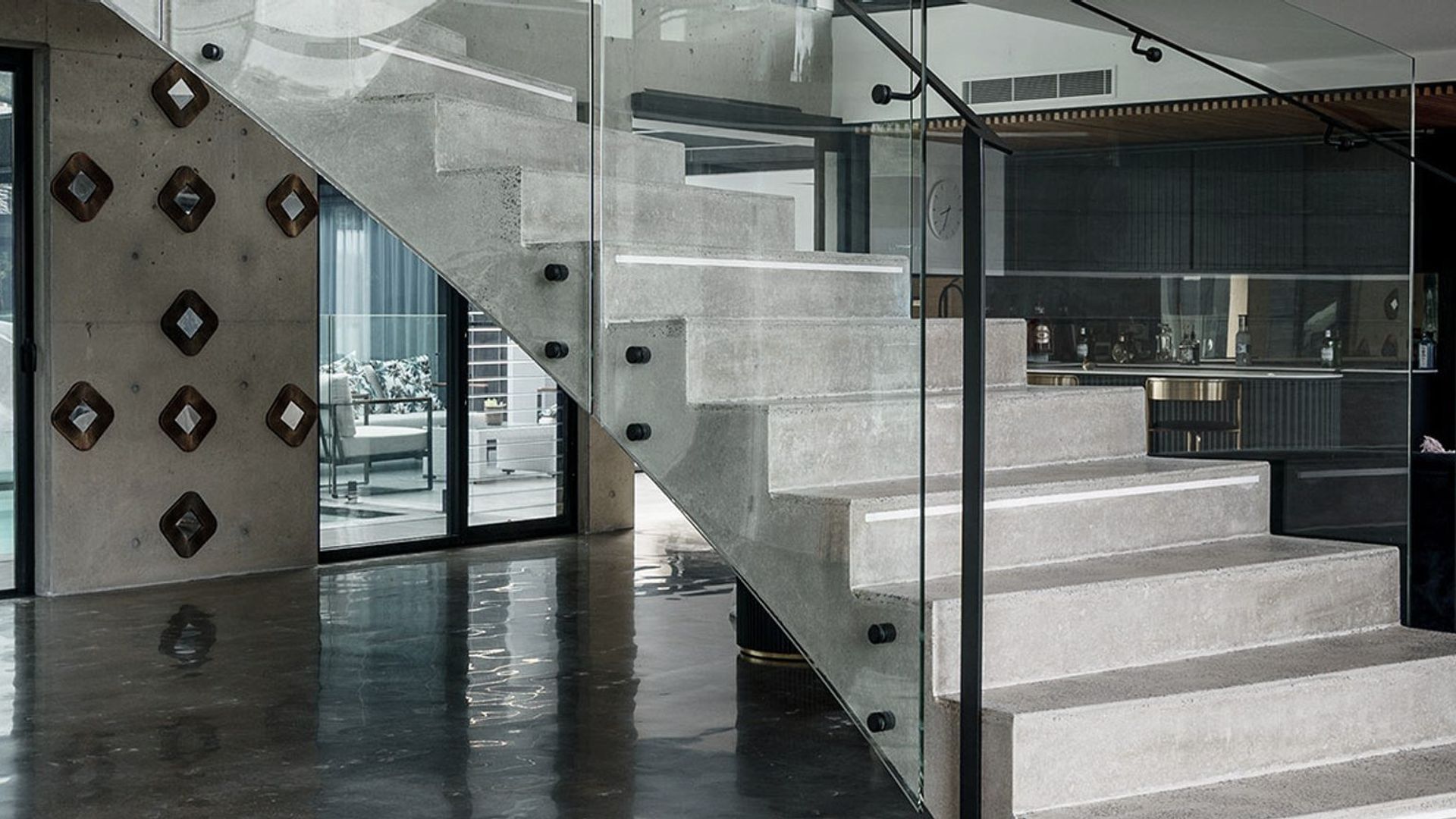 The Esplanade – Twin Bent Glass Curved Staircase banner