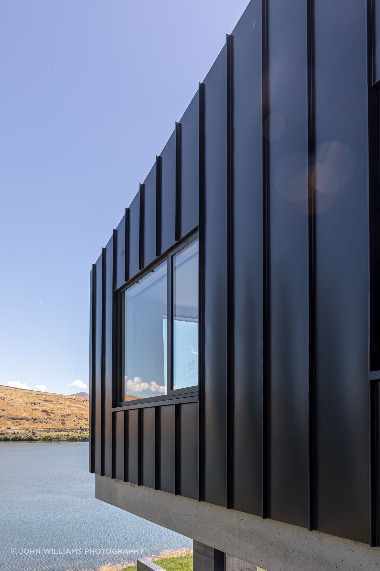 033-Ben-Hudson-Architects-Lake-House-lakeside-cantilever.jpg