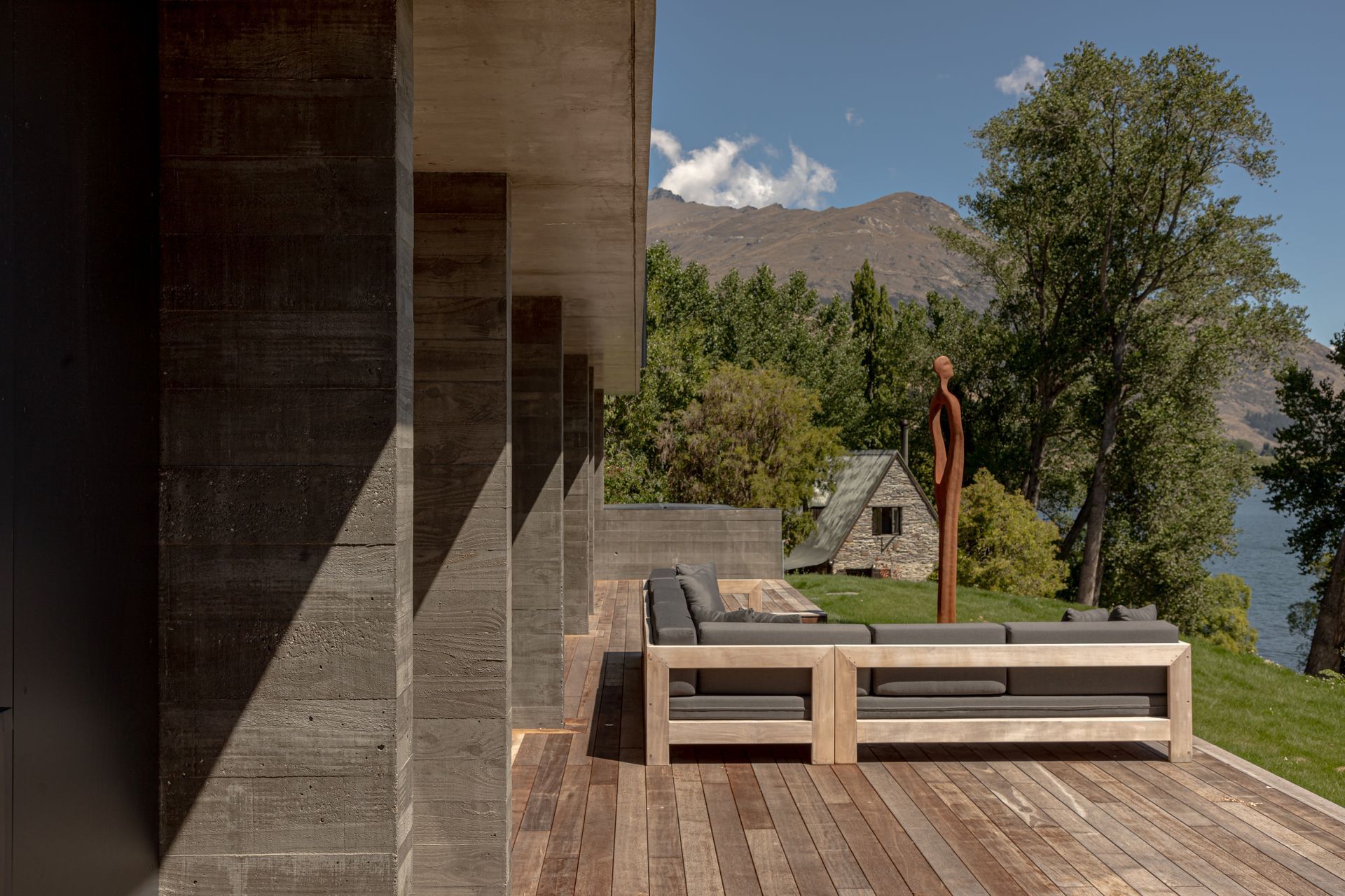 043-Ben-Hudson-Architects-Lake-House-lakeside-family-terrace.jpg