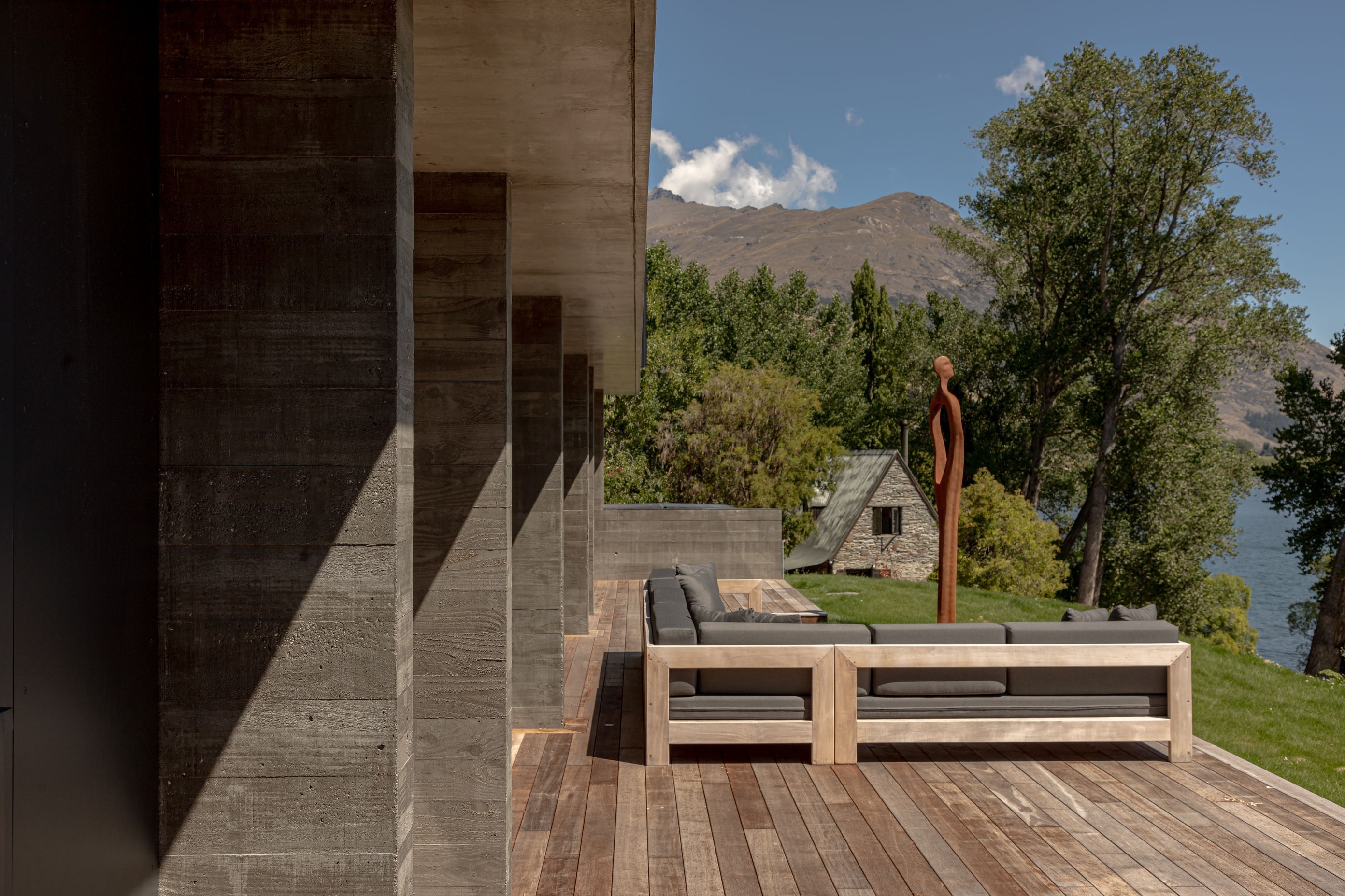 043-Ben-Hudson-Architects-Lake-House-lakeside-family-terrace.jpg
