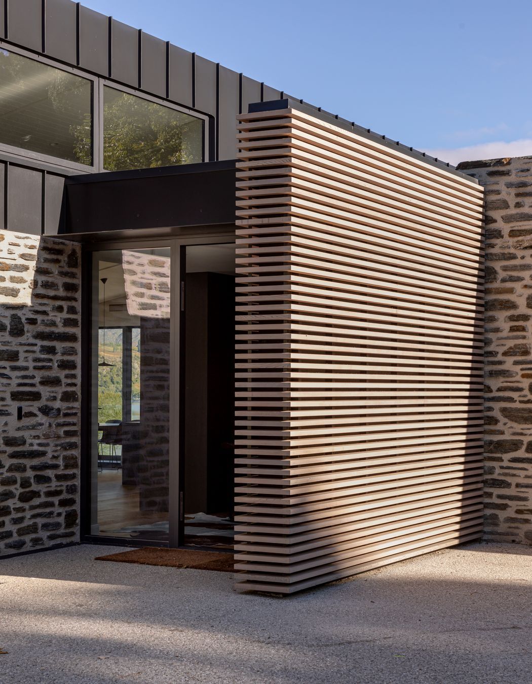 056-Ben-Hudson-Architects-Lake-House-main-entry.jpg
