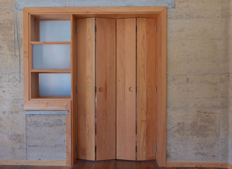 Bi-fold doors with book shelf