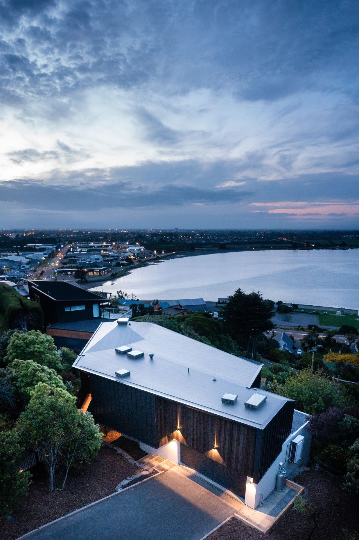 The home captures stunning sea and city views.