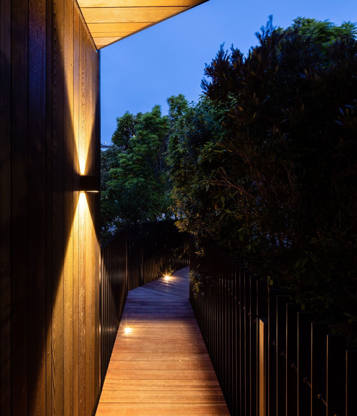 Looking back to the property's entry - the cedar boardwalk creates the start of a journey towards the view.