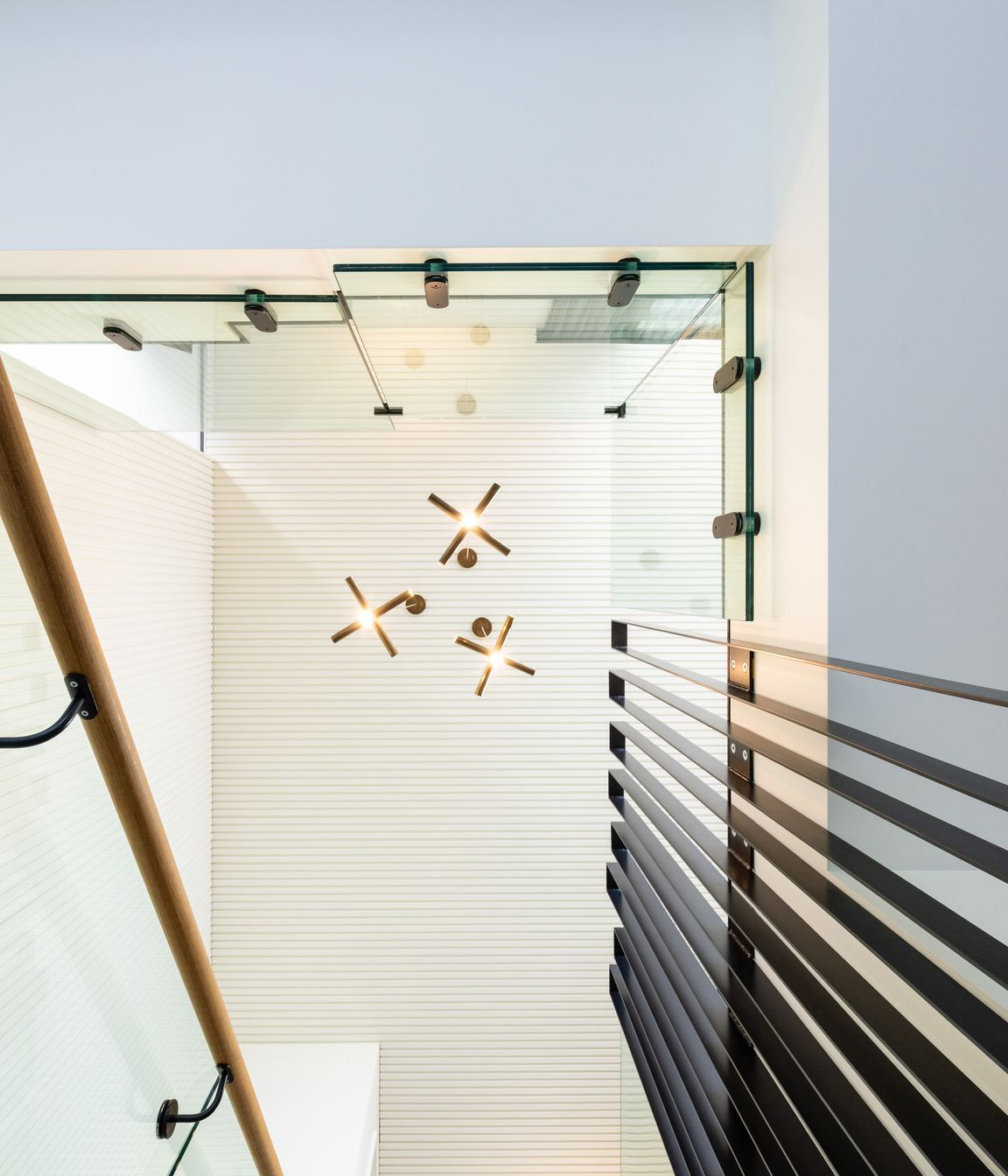 A dramatic view to the ceiling above the stairs.