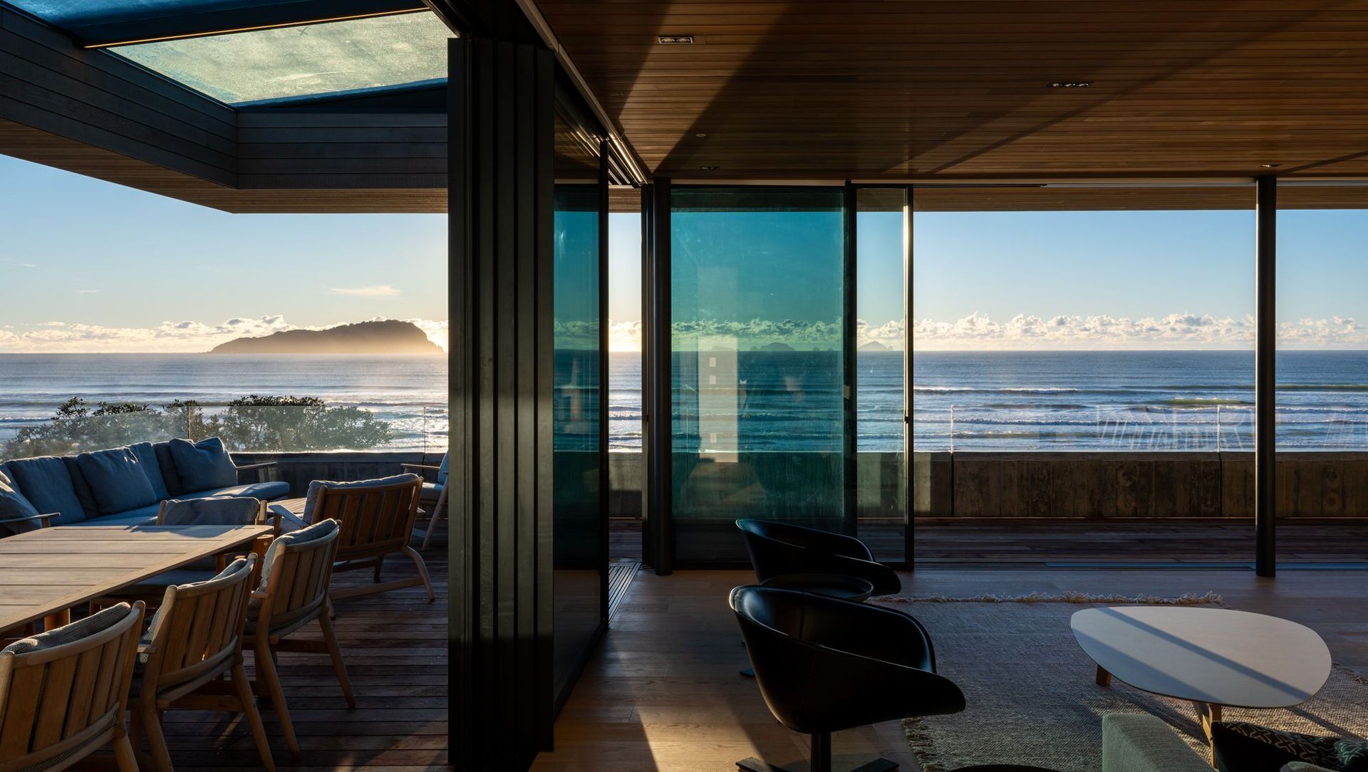 Pauanui Beach House with Automated Roller Blinds by Lahood Window Furnishings
