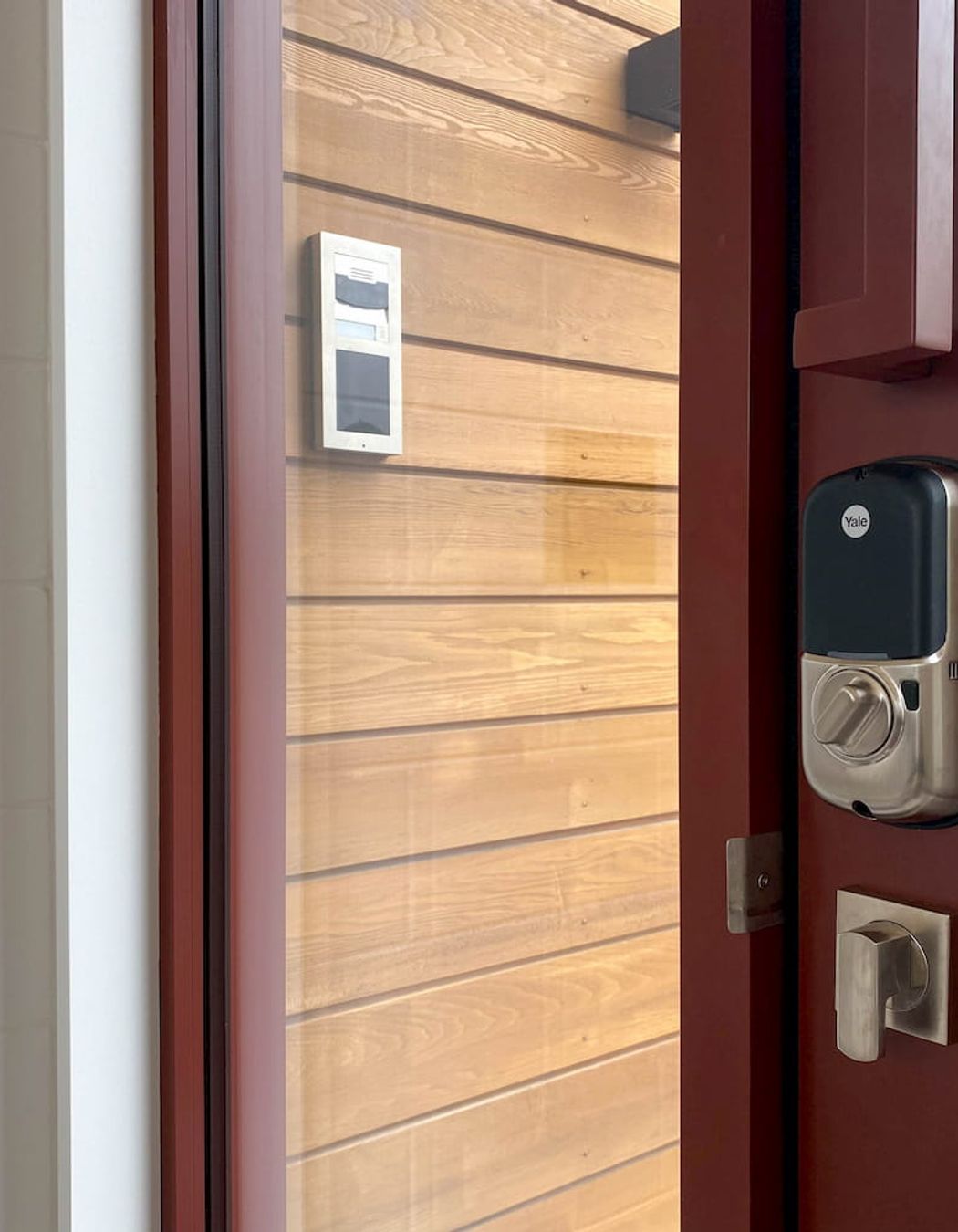 Keyless lock and intercom setting the tone of this home which embraced modern technology throughout.