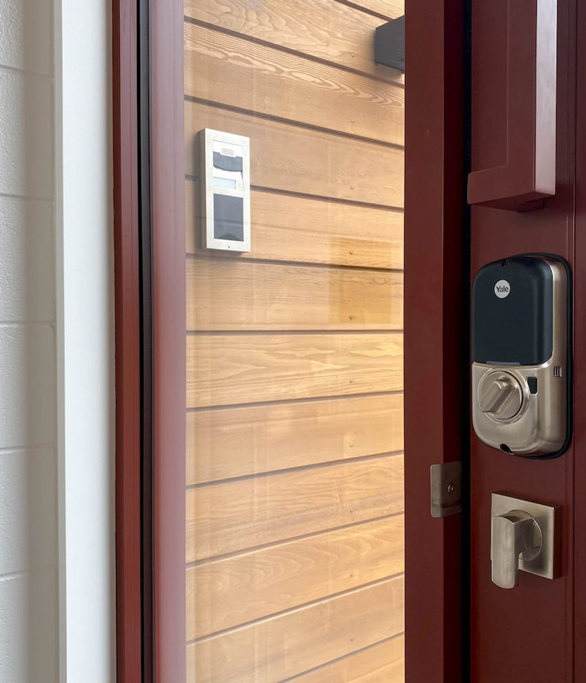 Keyless lock and intercom setting the tone of this home which embraced modern technology throughout.