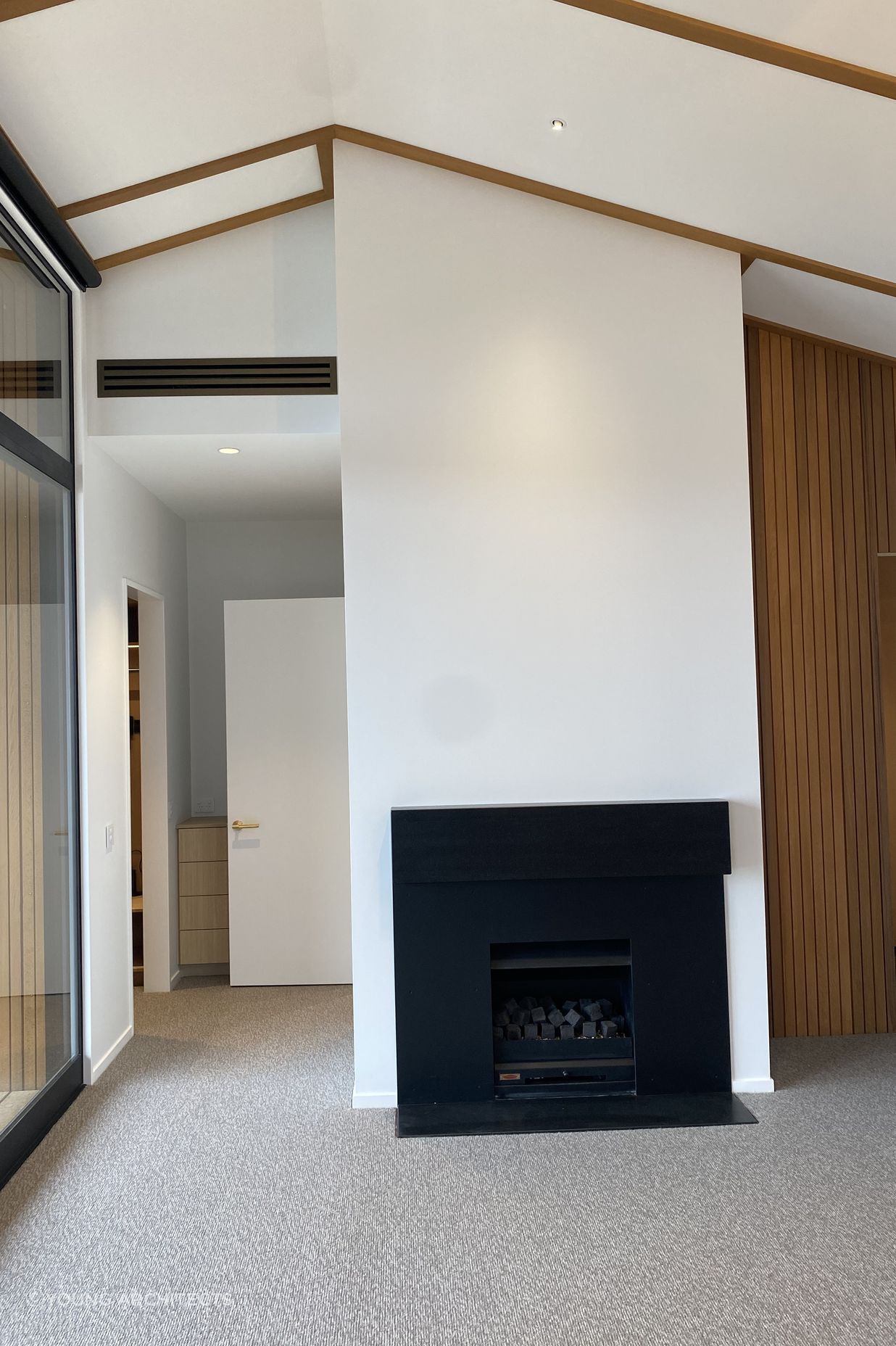 Clever automated blinds give a minimalist look to this home removing the need for fussy chains.