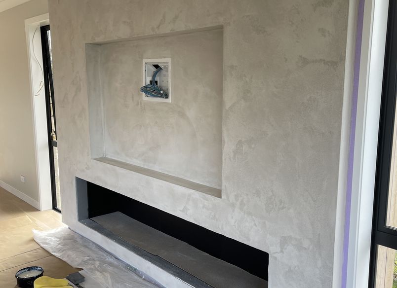 Resistone microcement fireplace